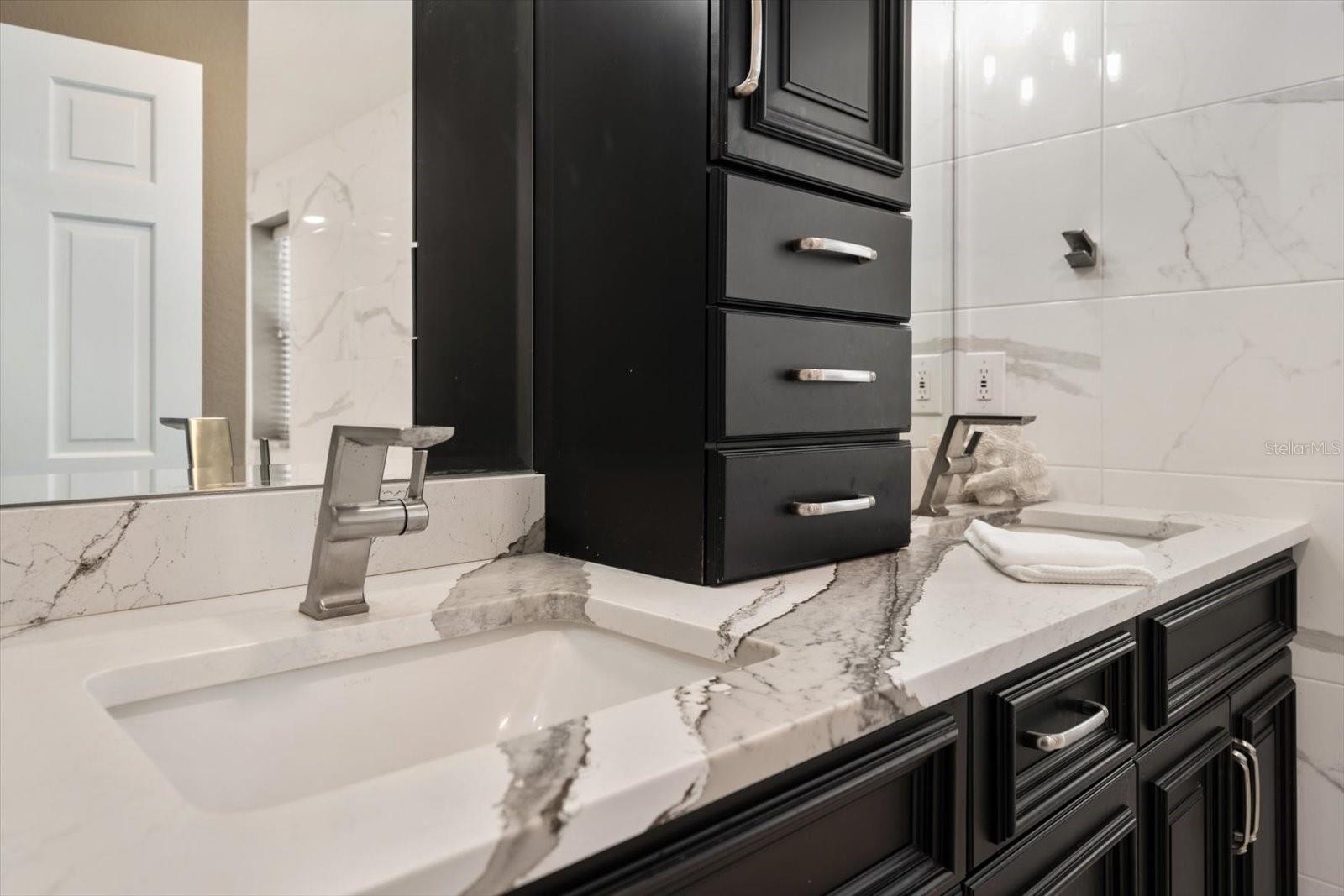 Cambria tile, stellar fixtures and much more!