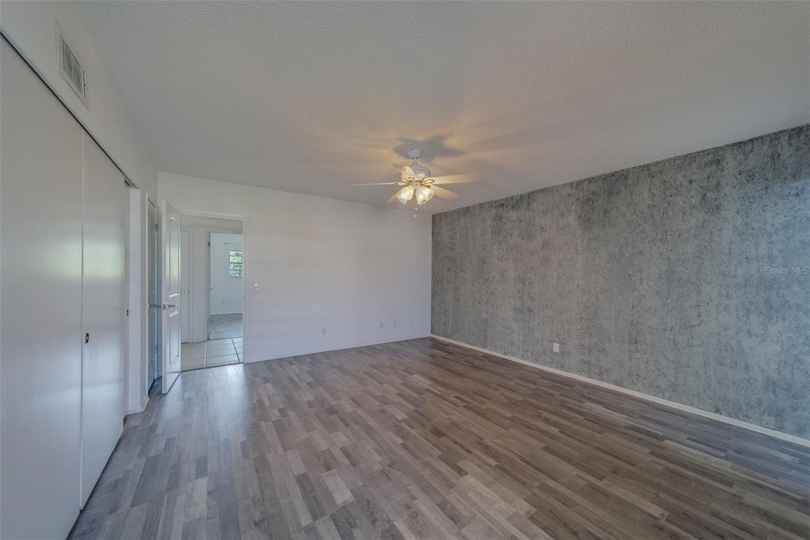 Primary Bedroom comes equipped with a washer and dryer that is practically new!