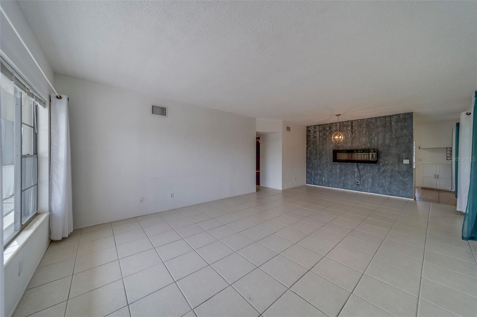Beautiful Living/dining Room with electric fireplace