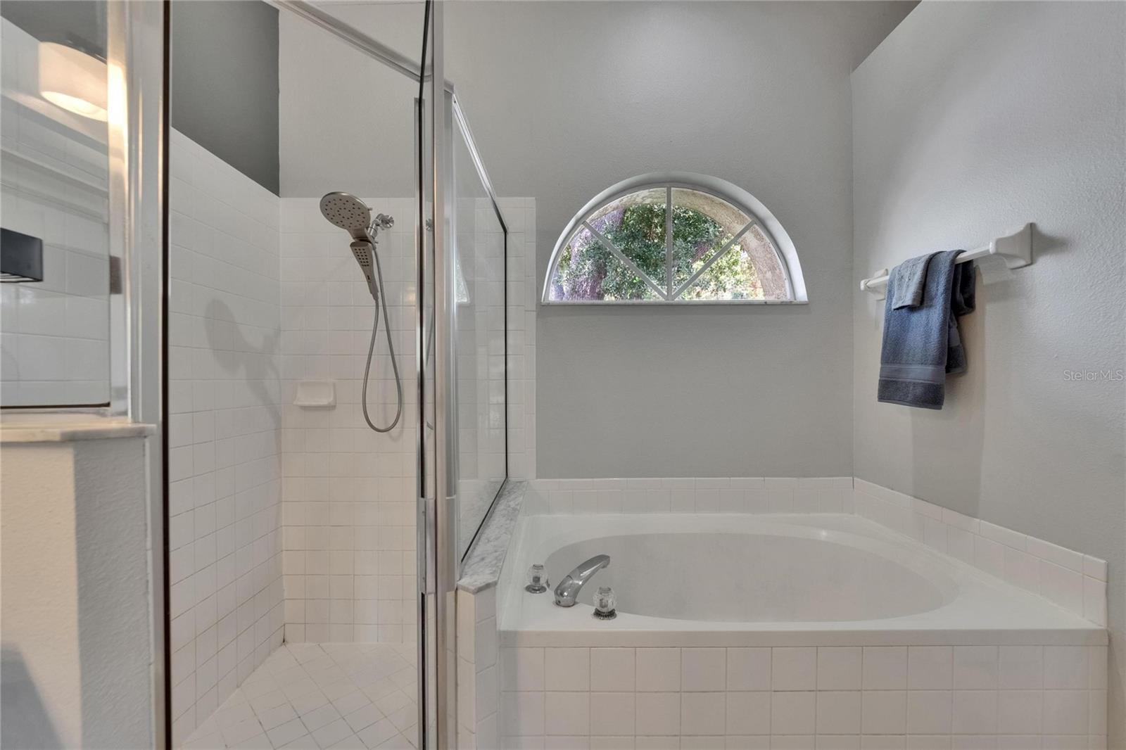 Shower and tub combo in primary bathroom