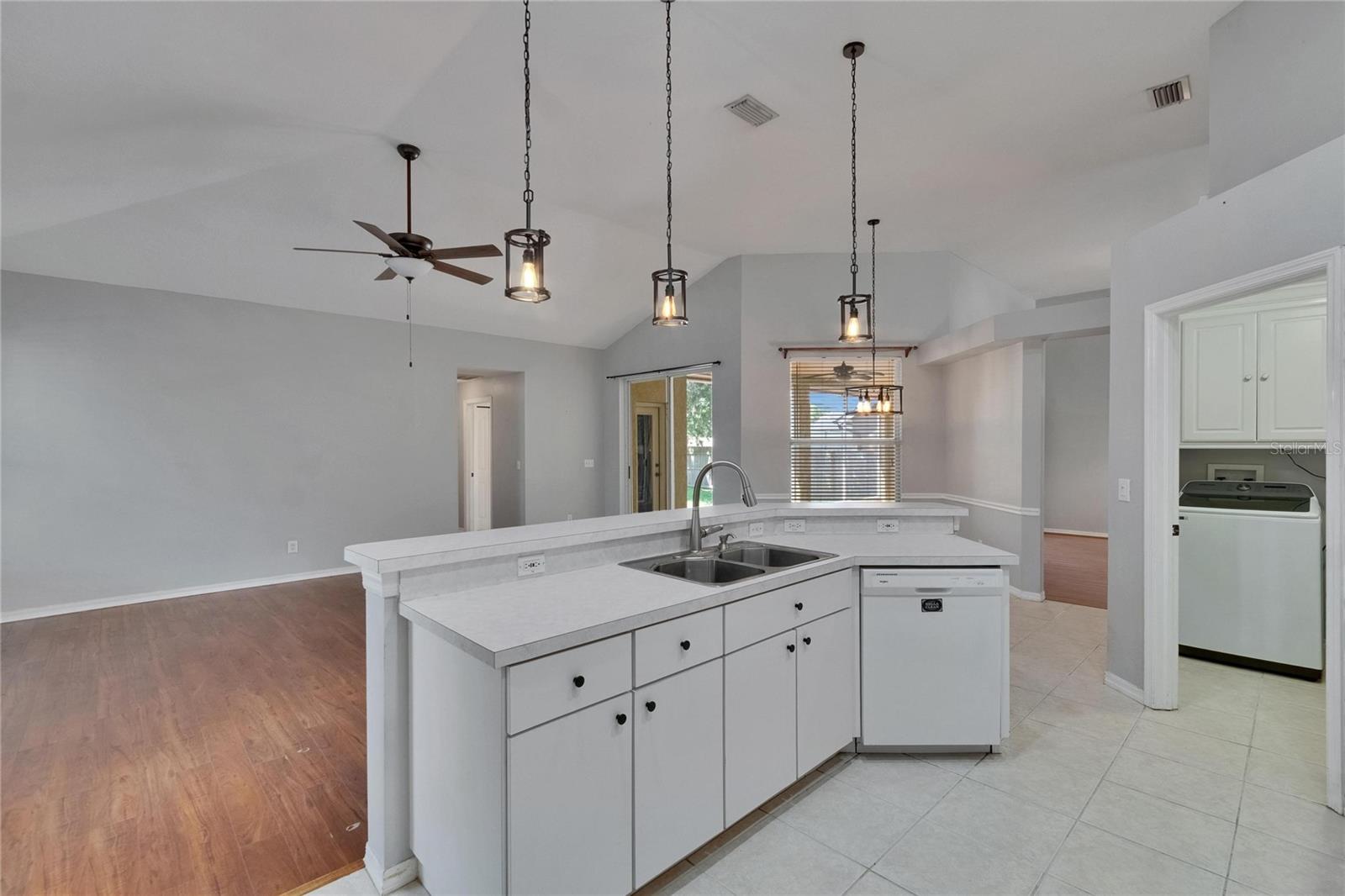 Kitchen Island.  Door to right to Laundry Room.