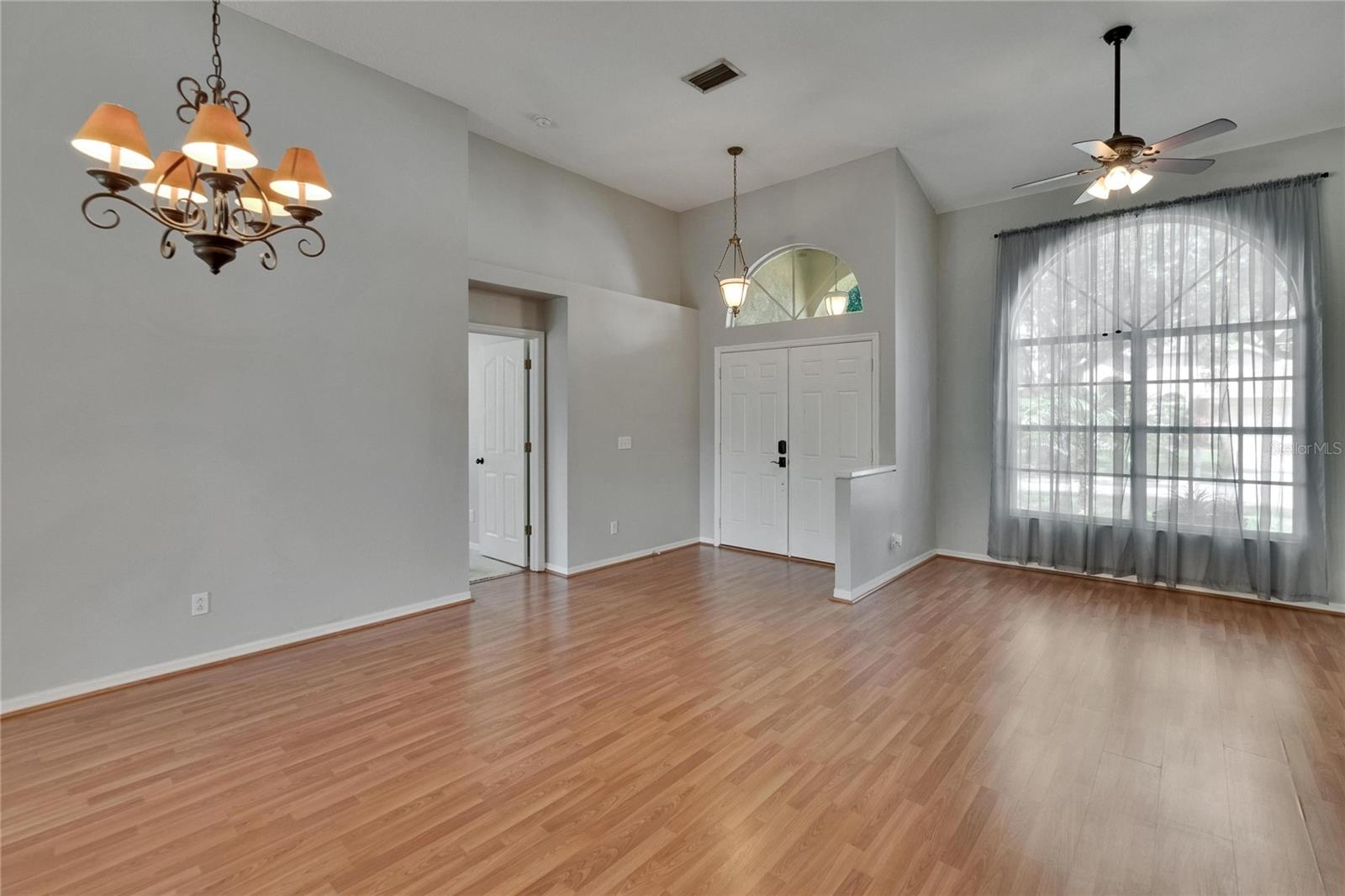 Primary Bedroom Door, Front Doors and Dining Room