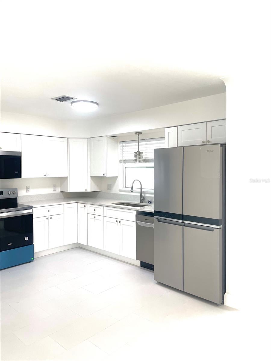 New appliances, cabinets, and countertops.