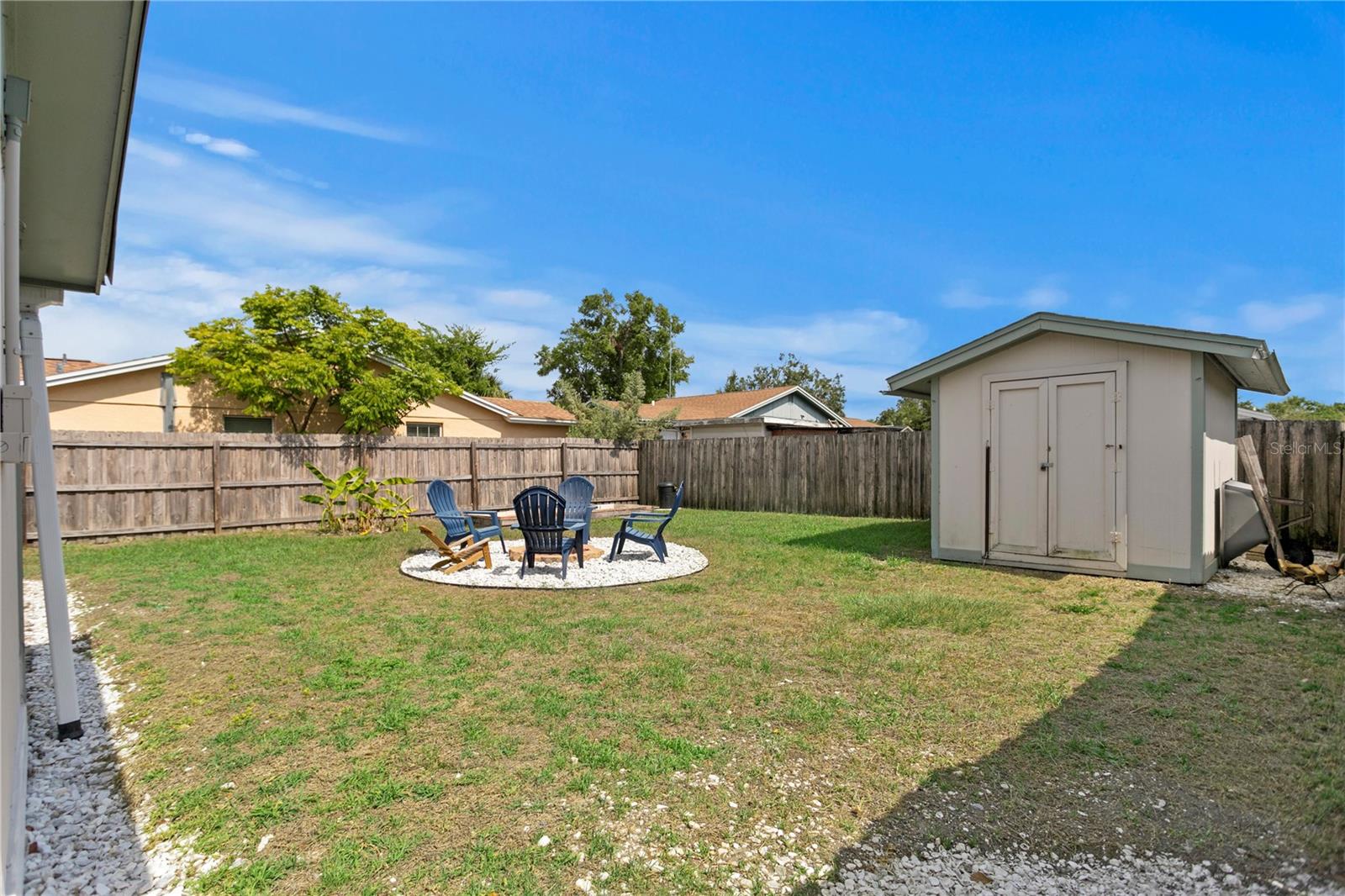 Back yard with shed and Fire Pit