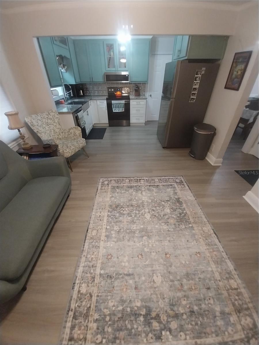 Nice living area at the front of the house flows directly into the kitchen.