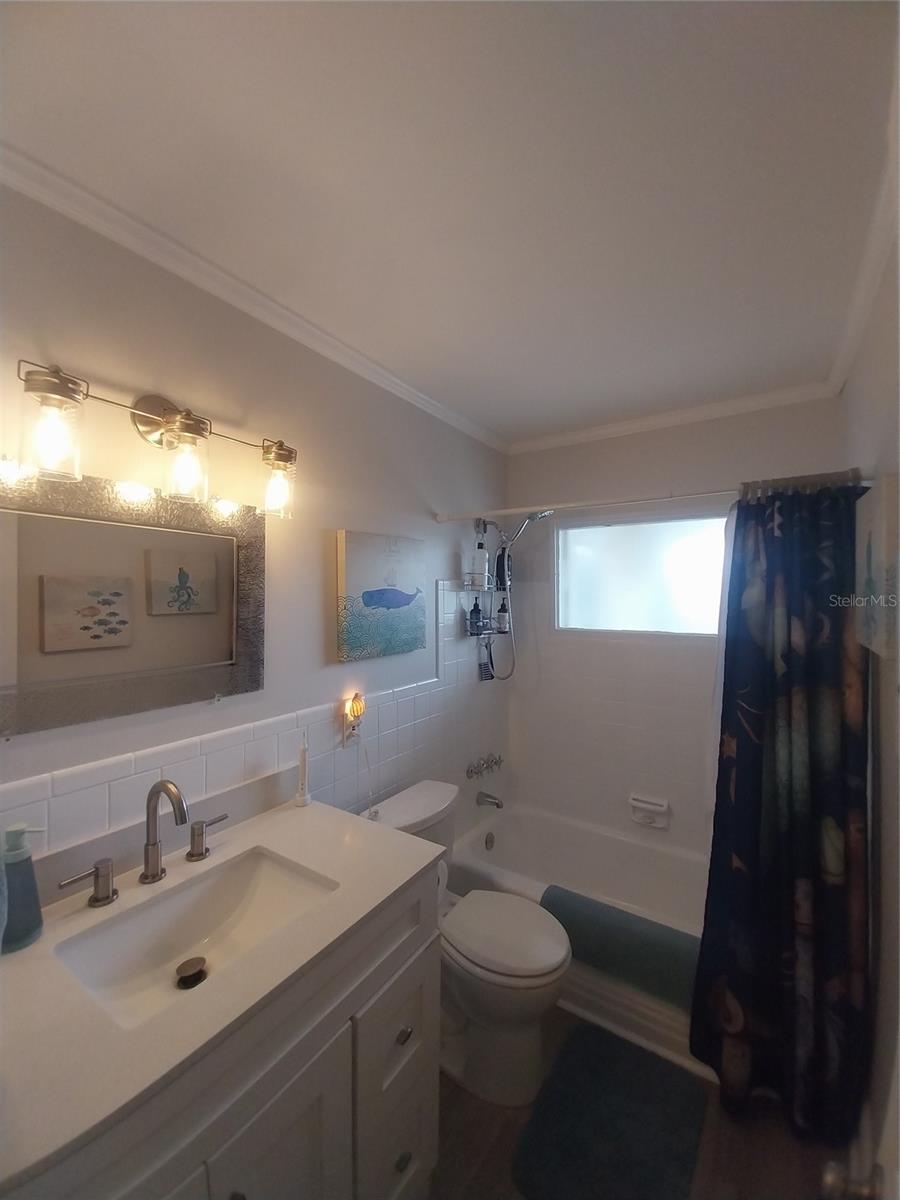 Nicely updated hall bathroom.