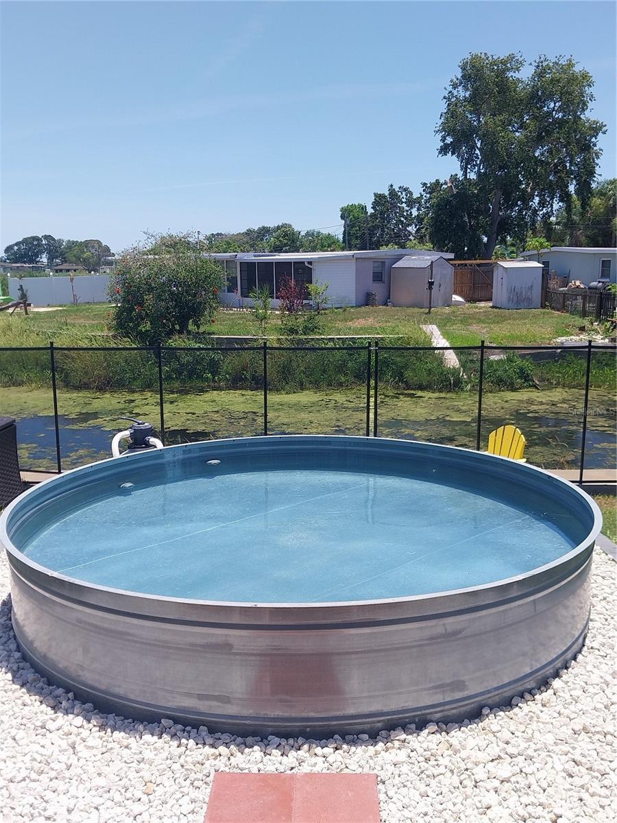 Galvanized stock tank pool.