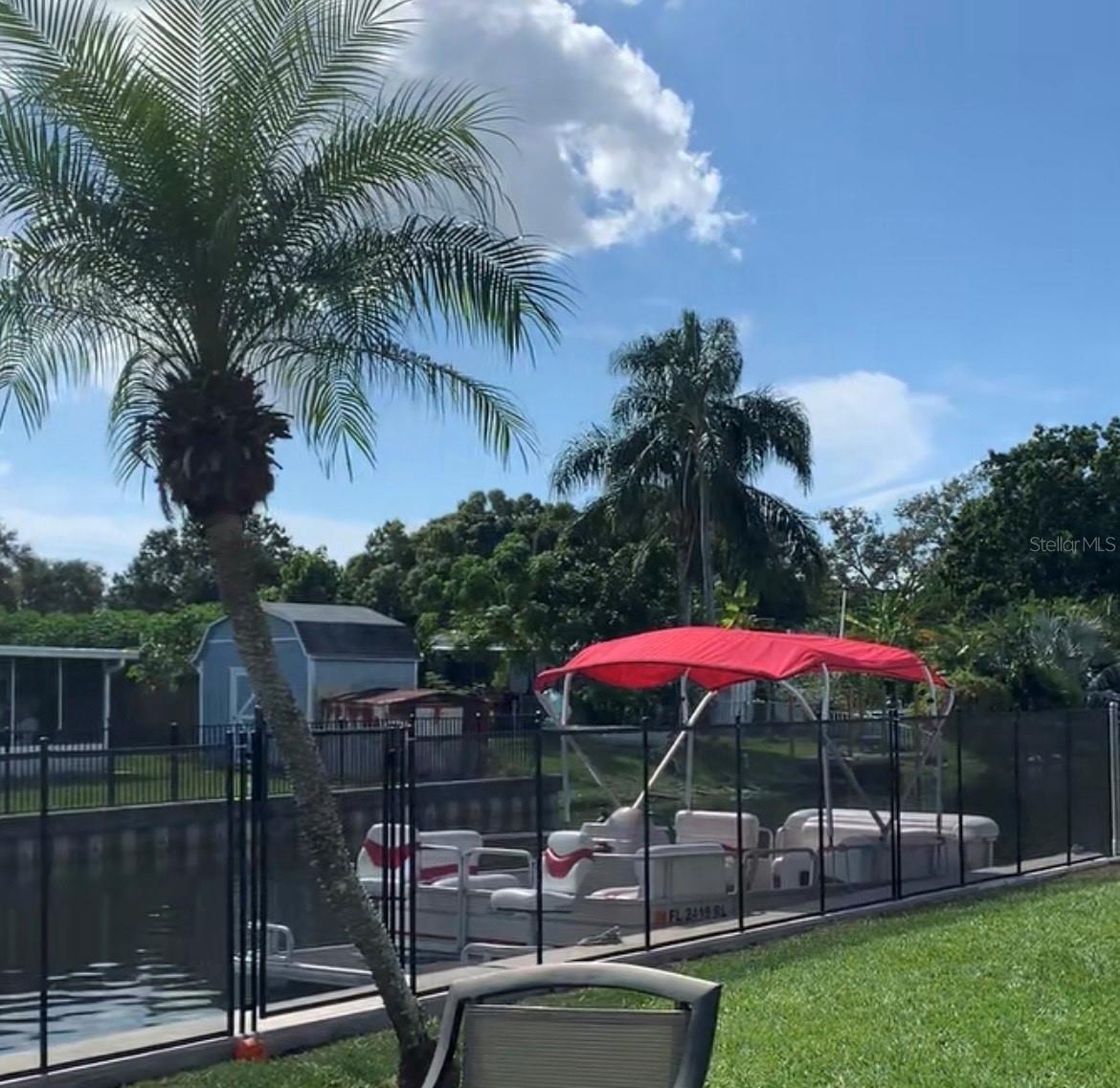 New 60' concrete seawall for your water toys also has a removable mesh fence.
