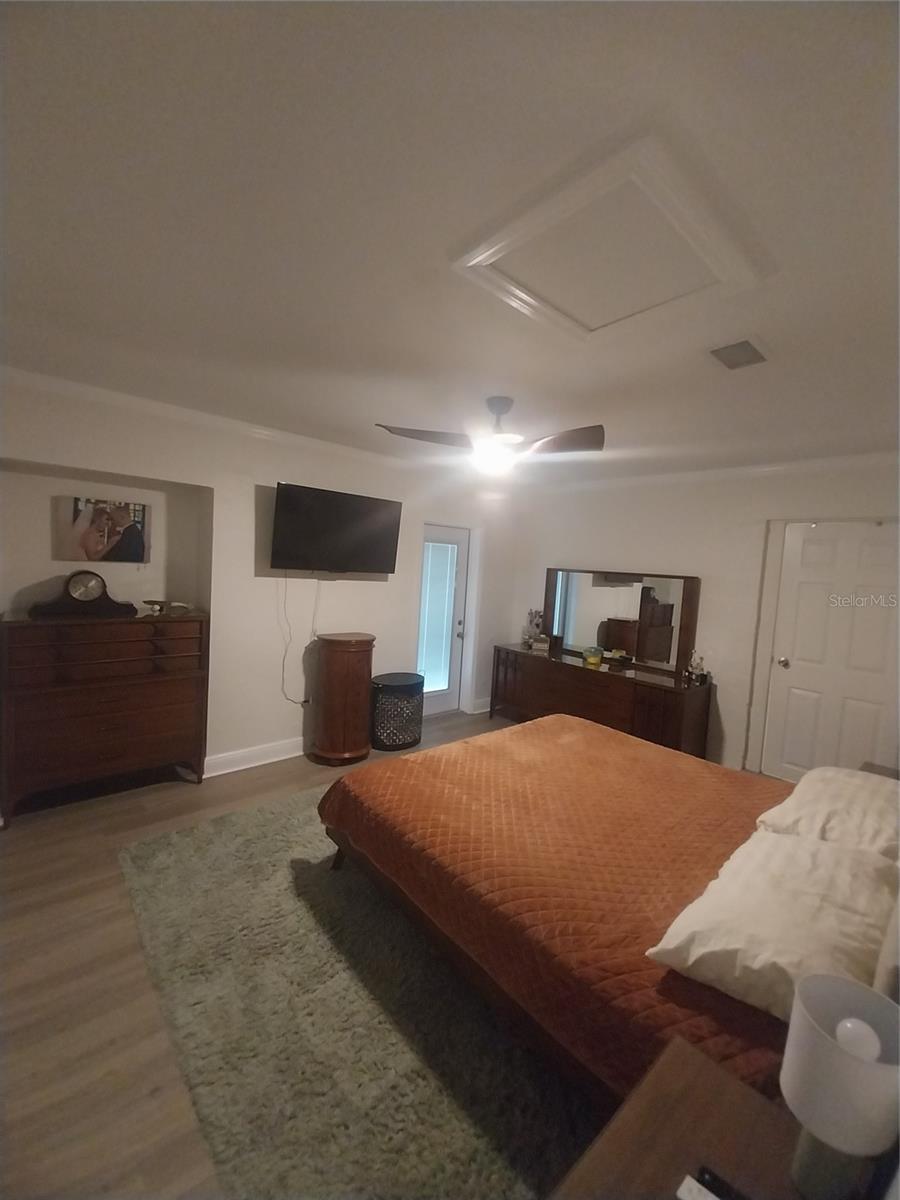 Large primary bedroom can easily accommodate a king and full suite of furniture.