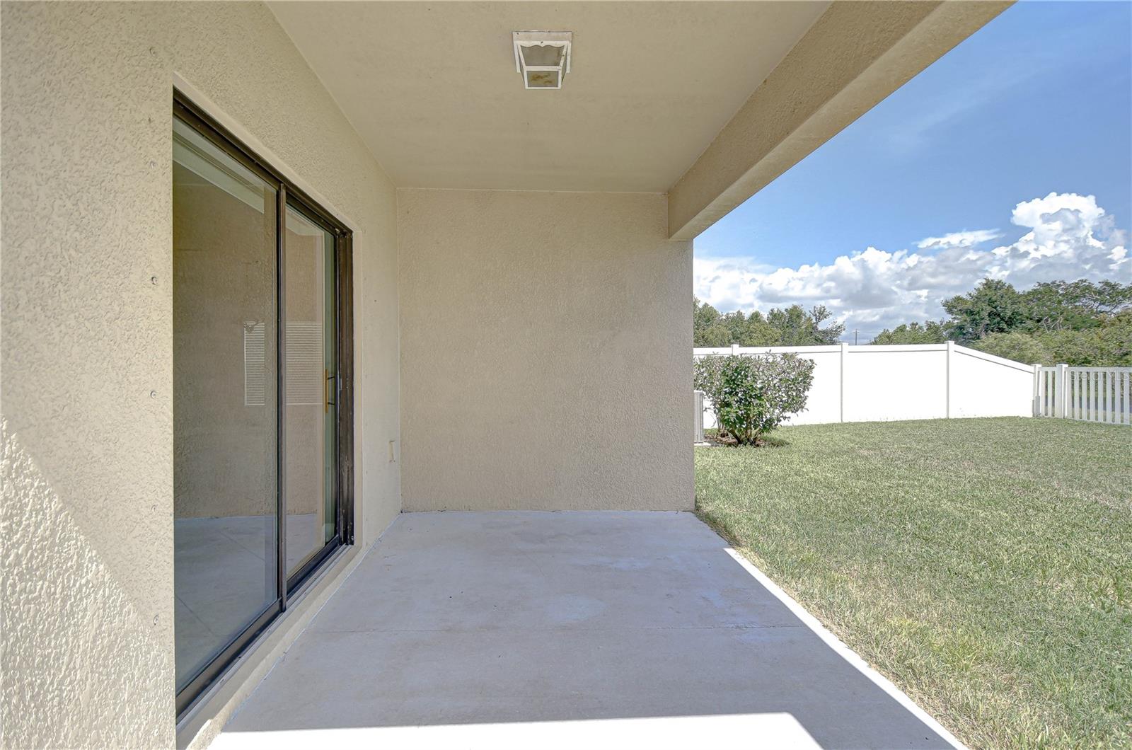 A nicely sized covered patio allows for you to relax on those summer days while still enjoying a view!