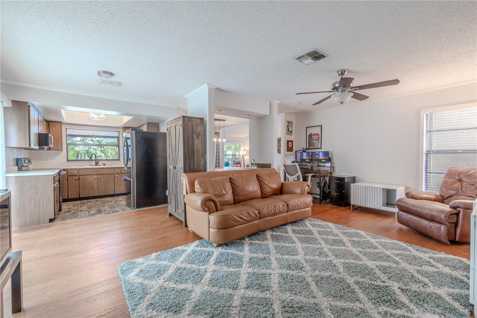 The family room is open to the kitchen.