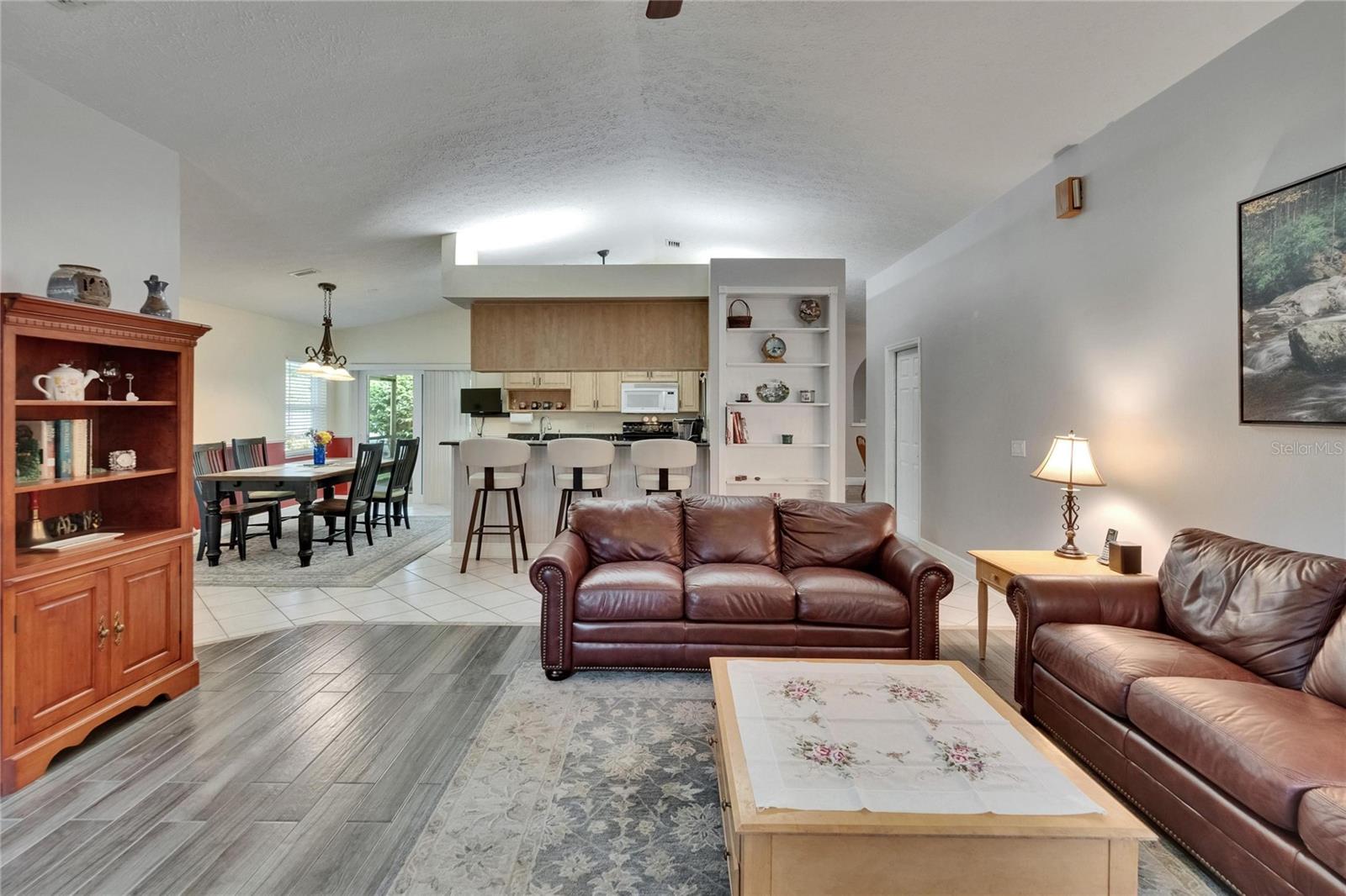 Family room with view to kitchen and dinette.