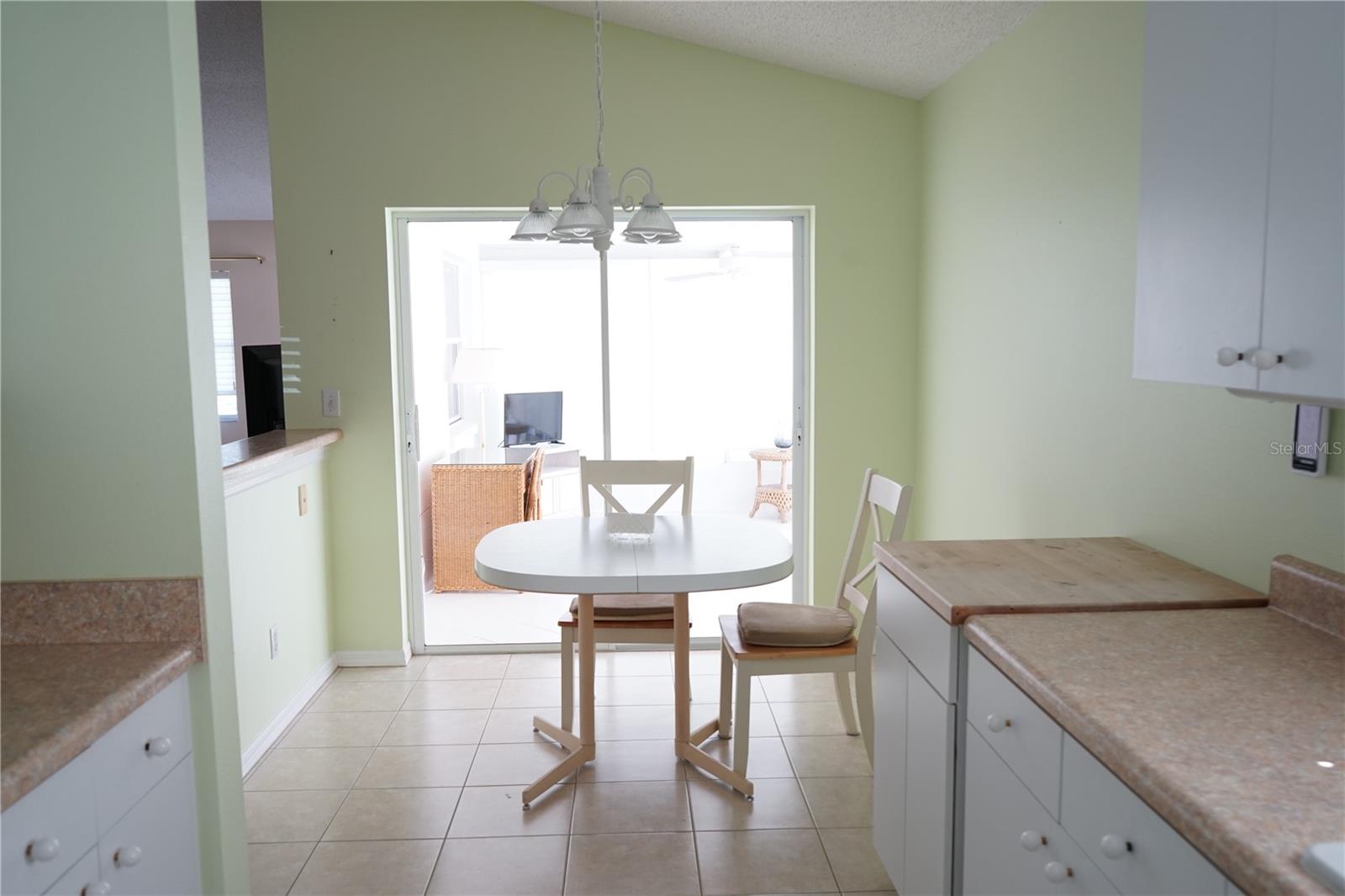 galley style kitchen and breakfast area