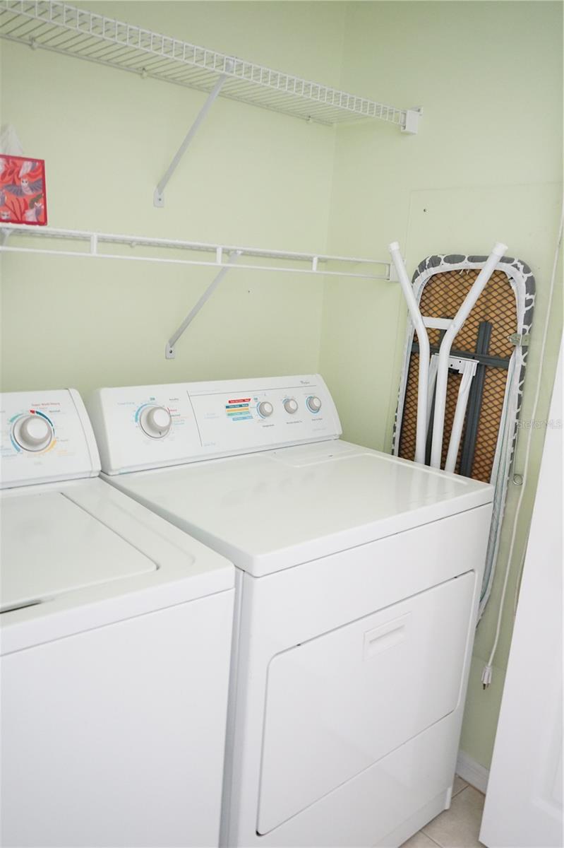 laundry closet is next to the kitchen