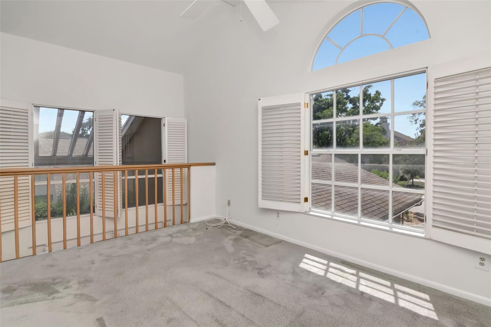 Light filled loft offers flex space and could easily. be converted to a 4th bedroom