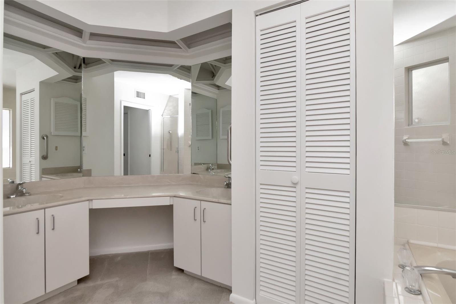 Large FIRST FLOOR primary bath plus double walk in closets