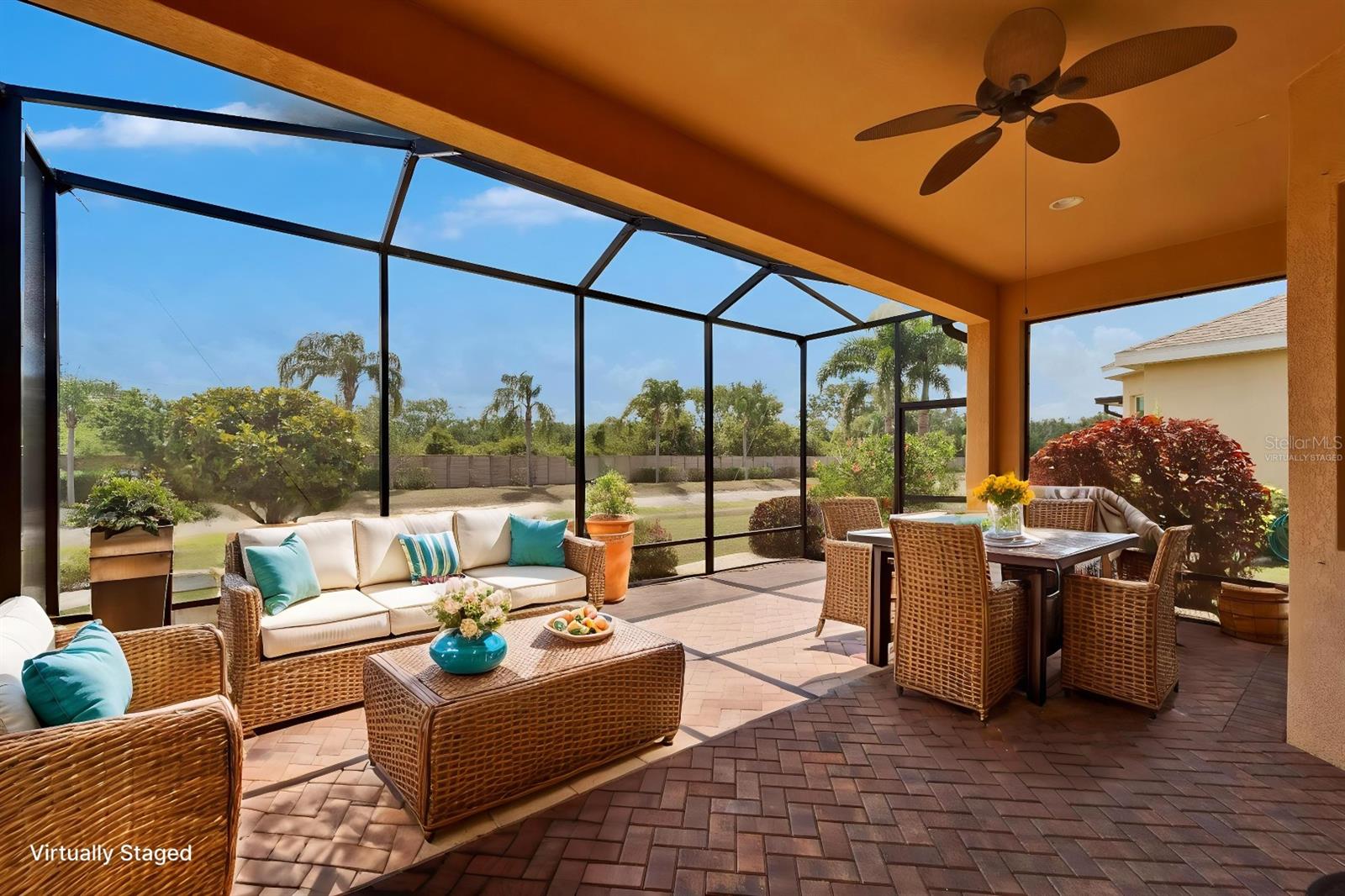 Screened lanai with custom pavers – relax with serene pond view with foundations located in both directions & NO REAR NEIGHBORS - Virtually Staged