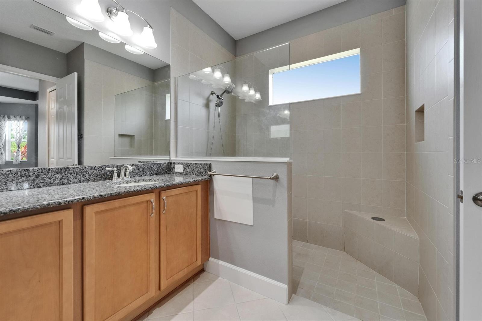 Step free shower with glass