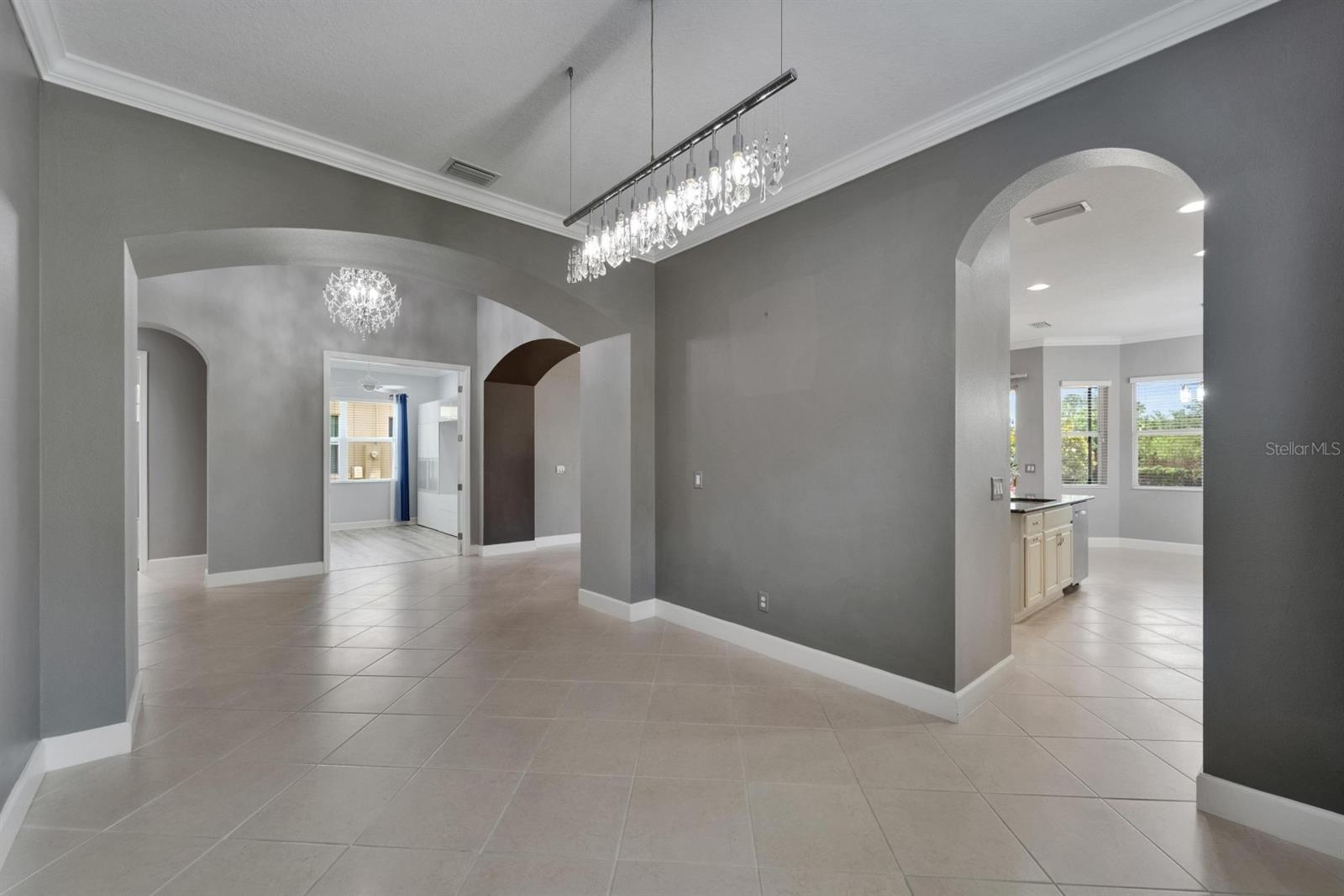 Dining Room Formal dining room with crystal designer chandelier
