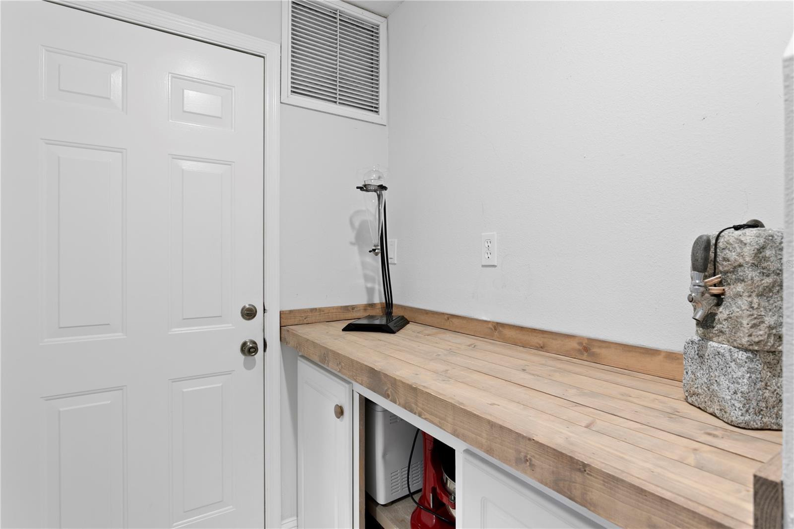 Convenient drop zone just inside the garage entry - perfect for everyday essentials.