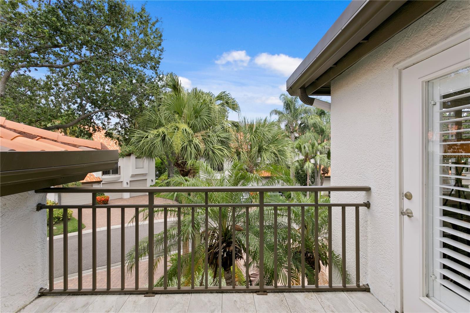 Located just off the primary suite, this balcony is a perfect spot for a cup of coffee and a newspaper to start your day!