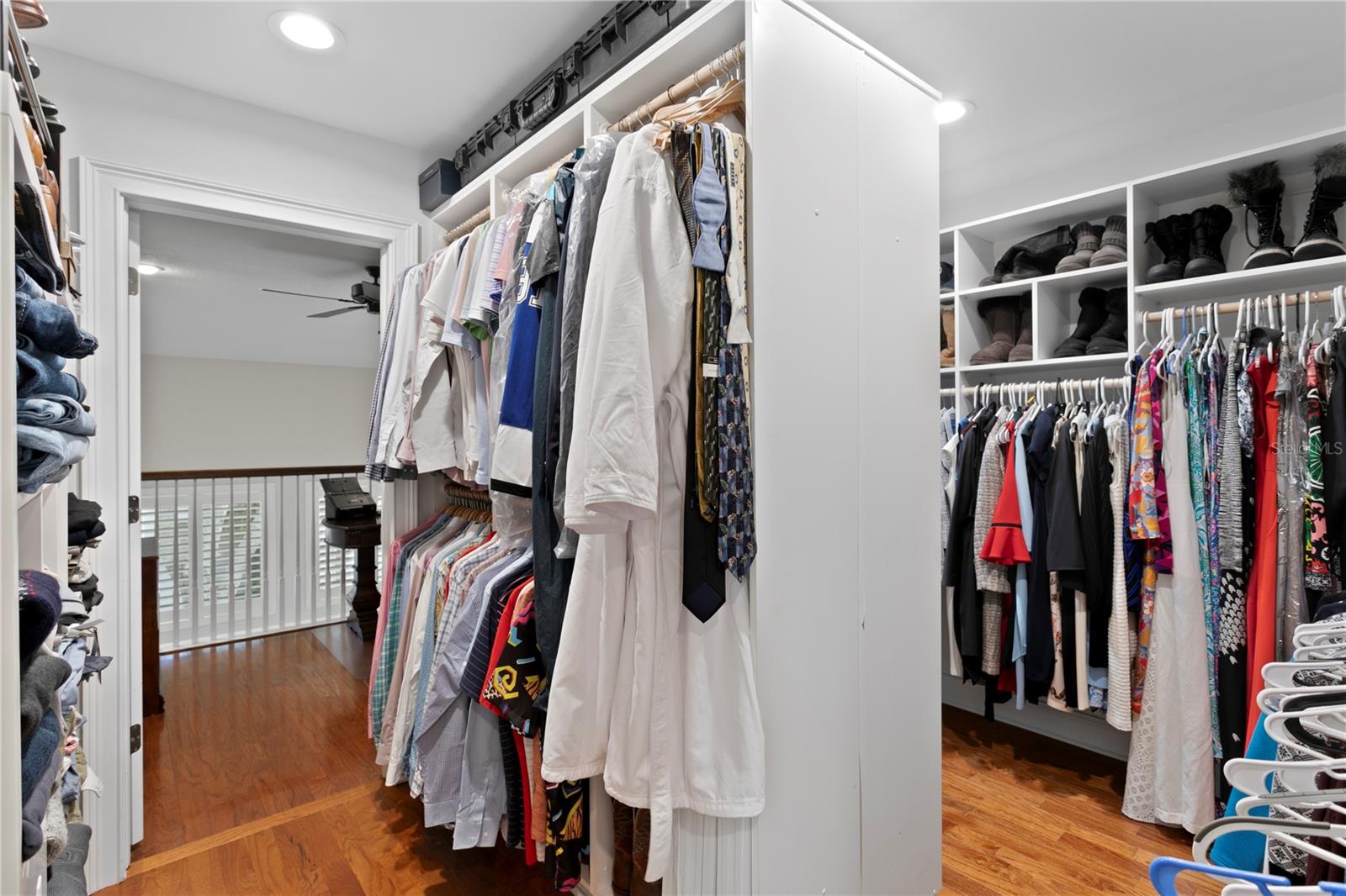 The primary bedroom features a custom-designed oversized closet, offering both elegance and utility.