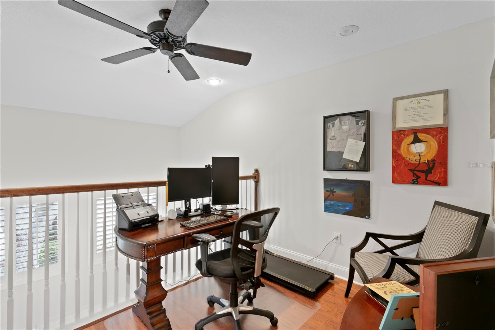 This tucked-away loft offers a quiet extension of the primary suite, perfect for a cozy reading area or office.