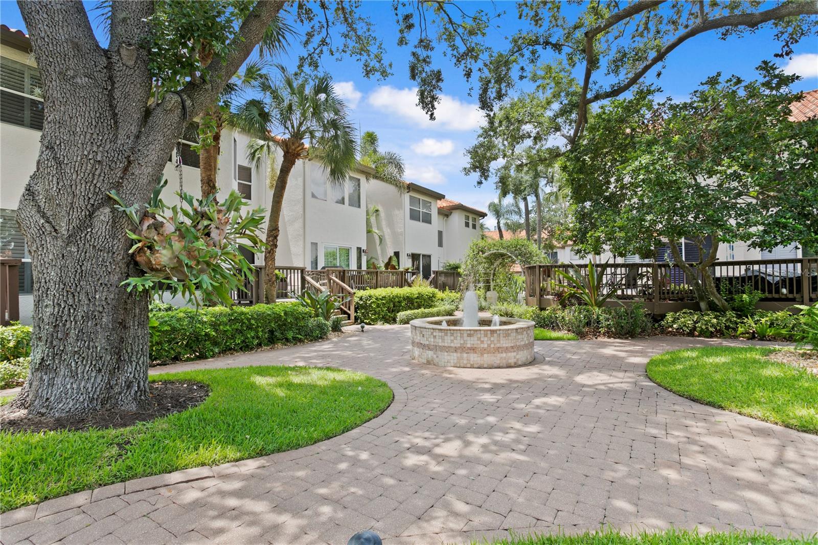 The courtyard at the center of the neighborhood is a shaded, quiet spot.