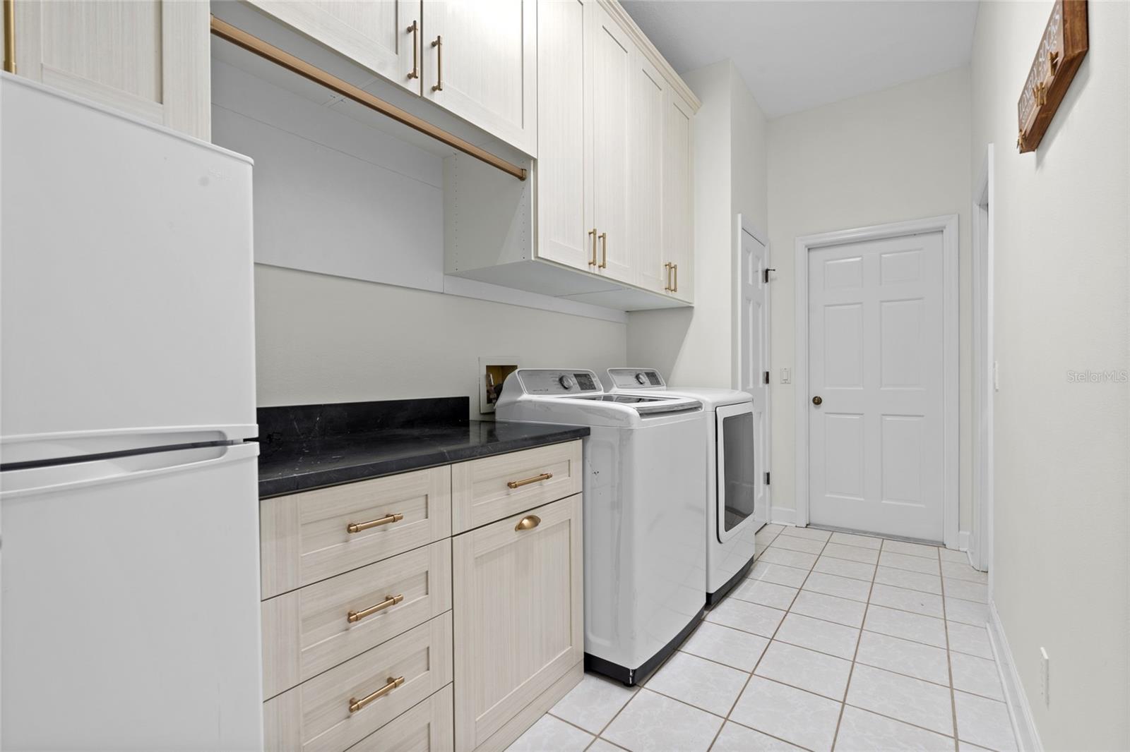 Laundry room with TONS of storage space