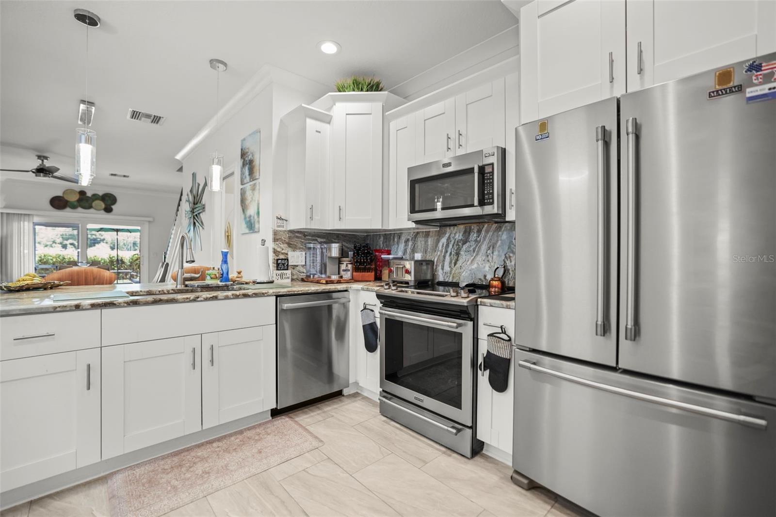 Large kitchen with Maytag and Bosch appliances