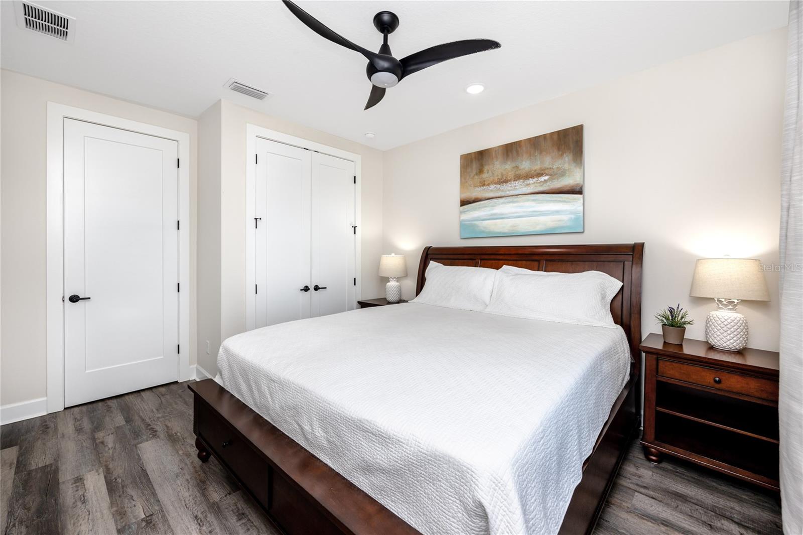 Master bedroom features two closets