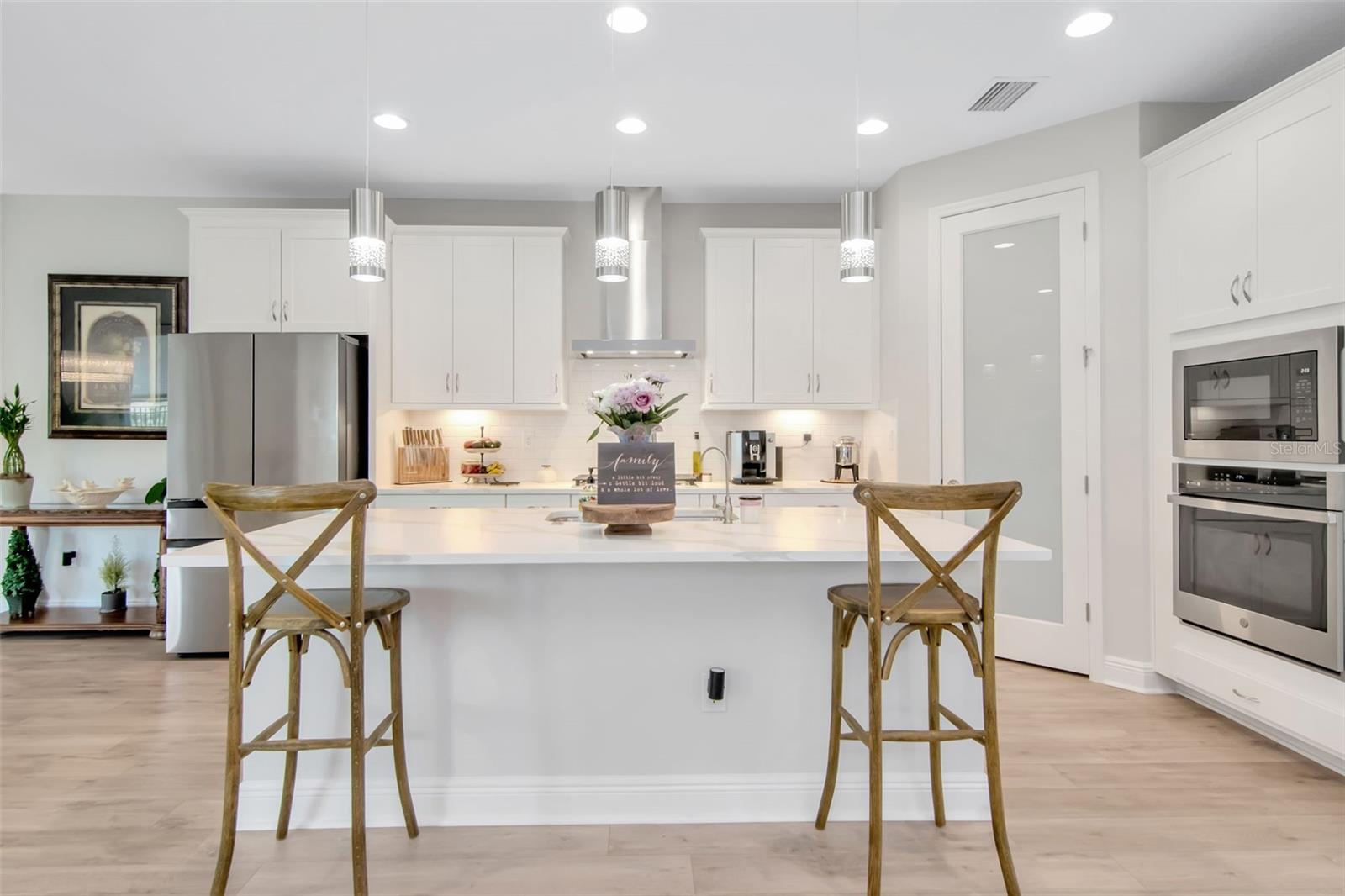 Clean lines, Stainless Steel appliances and plenty of storage