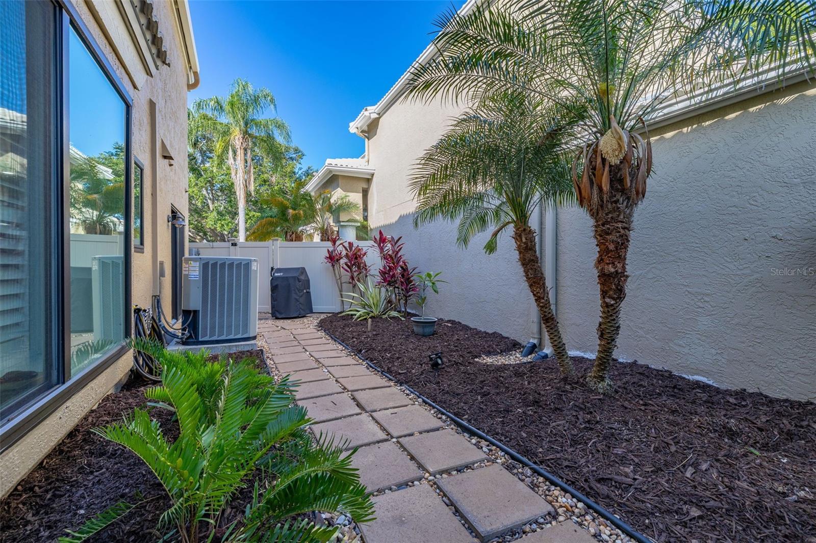 Courtyard Area to the Left of Screened Enclosure