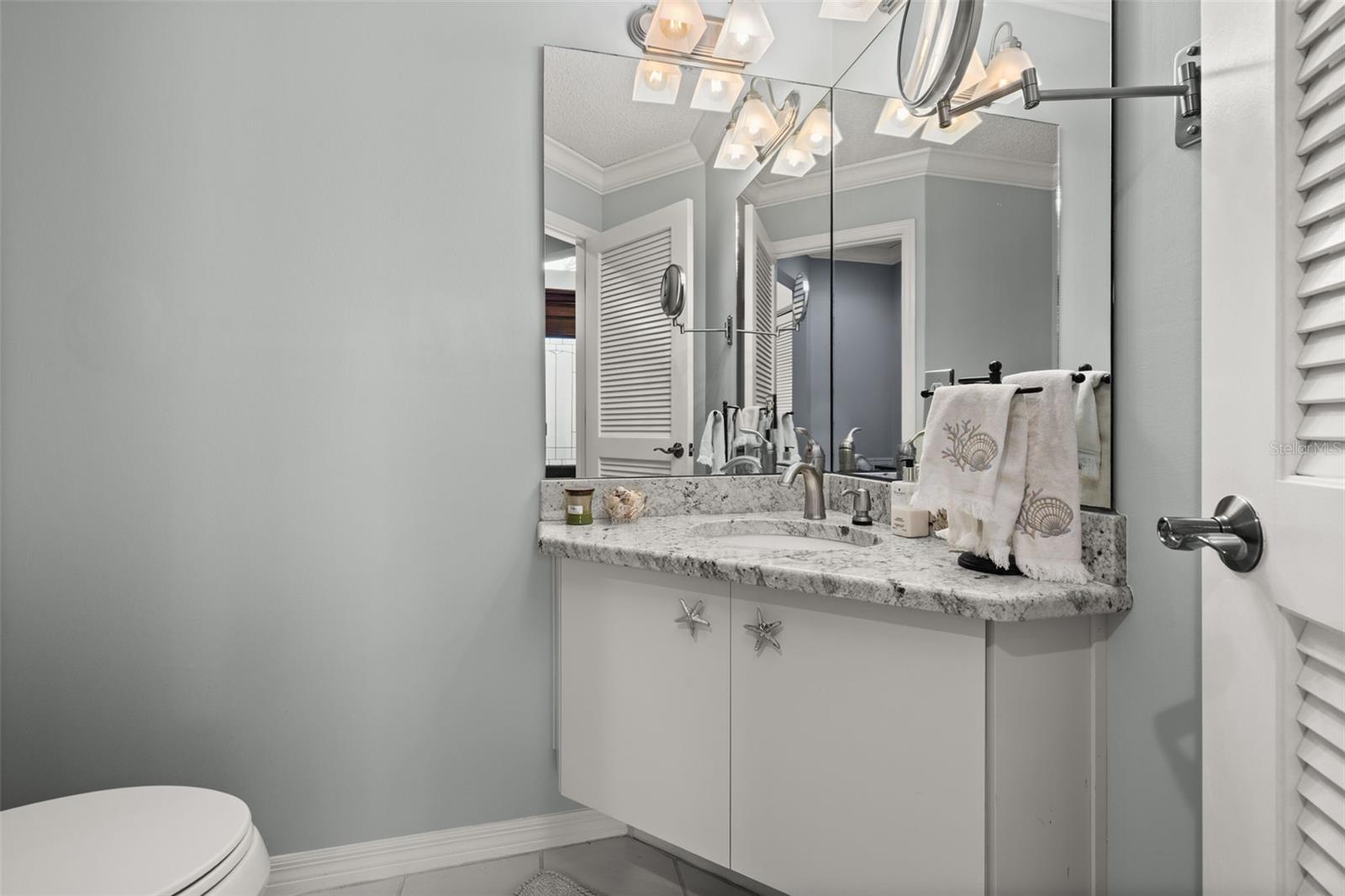Half Bath just off of the Foyer Area