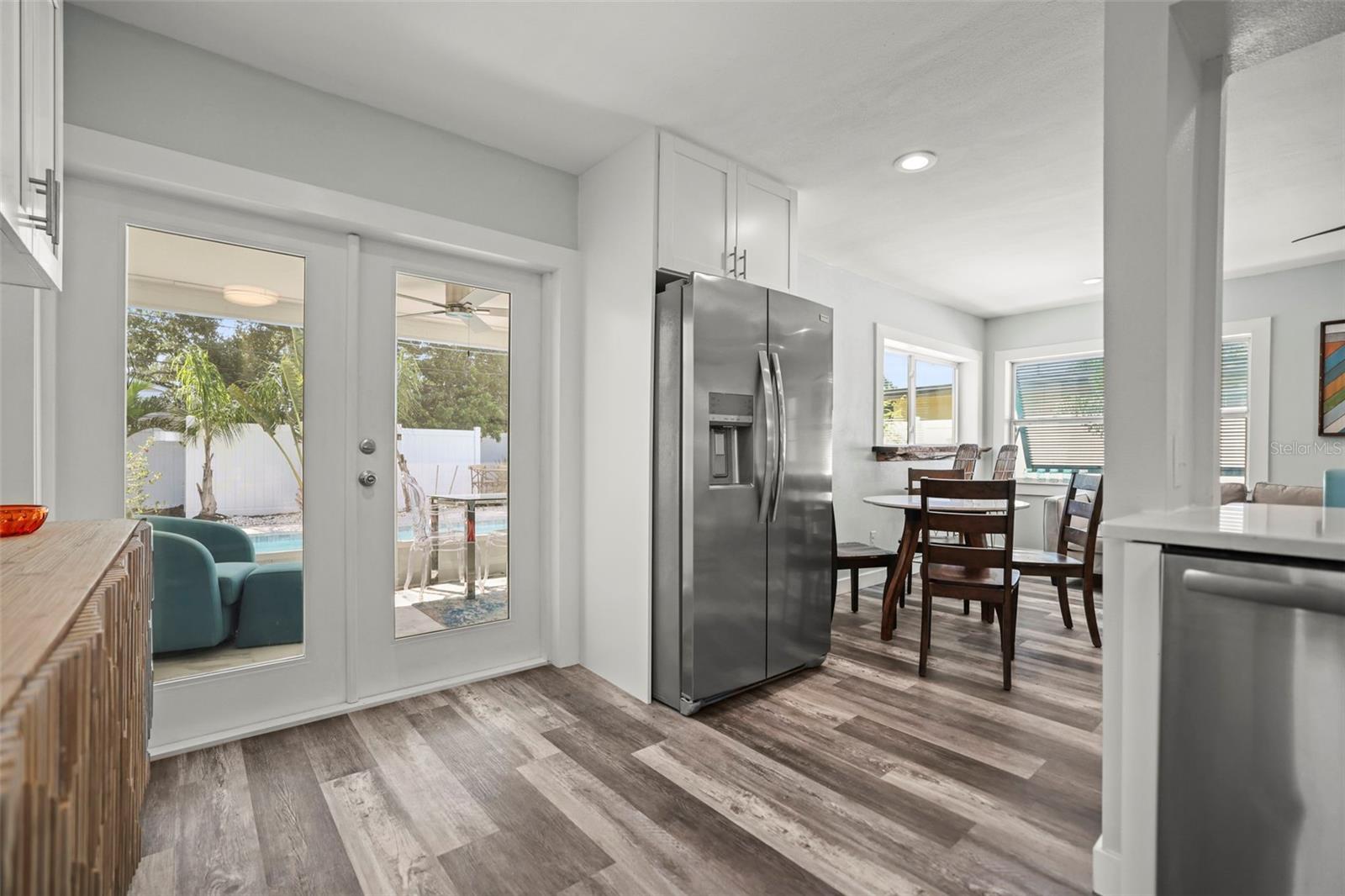 Bring the outdoors in.  Kitchen leads to the lanai and gorgeous backyard.