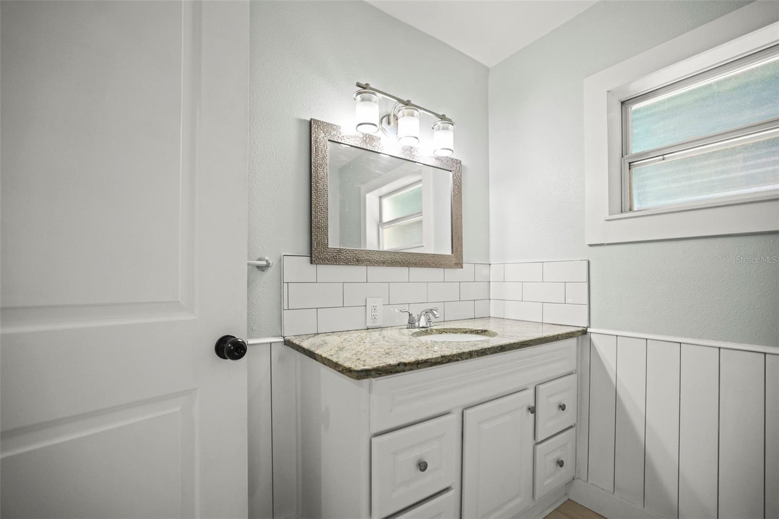 Updated bathroom with beadboard