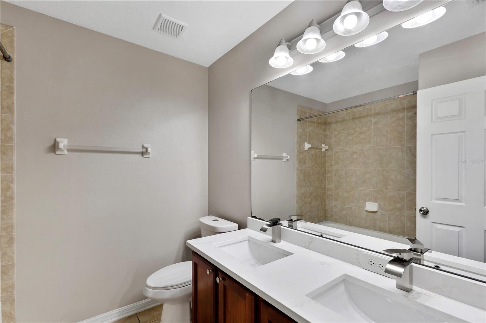 Double vanity bathroom with Quartz countertop