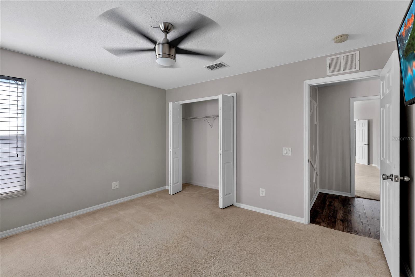large bedroom across from Owners Suite could double as an additional closet for Owners Ensuite