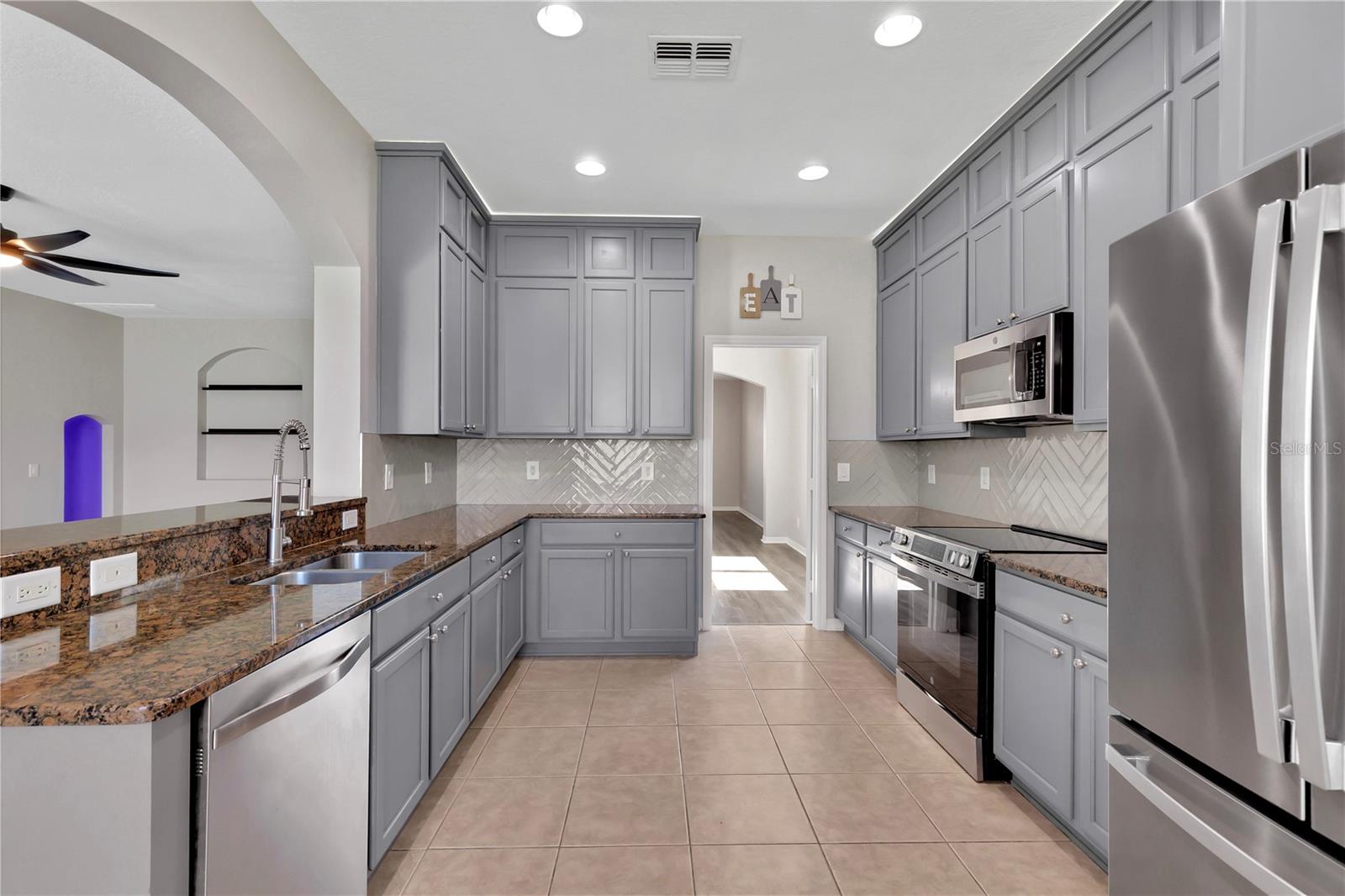 Kitchen with designer paint and luxury granite