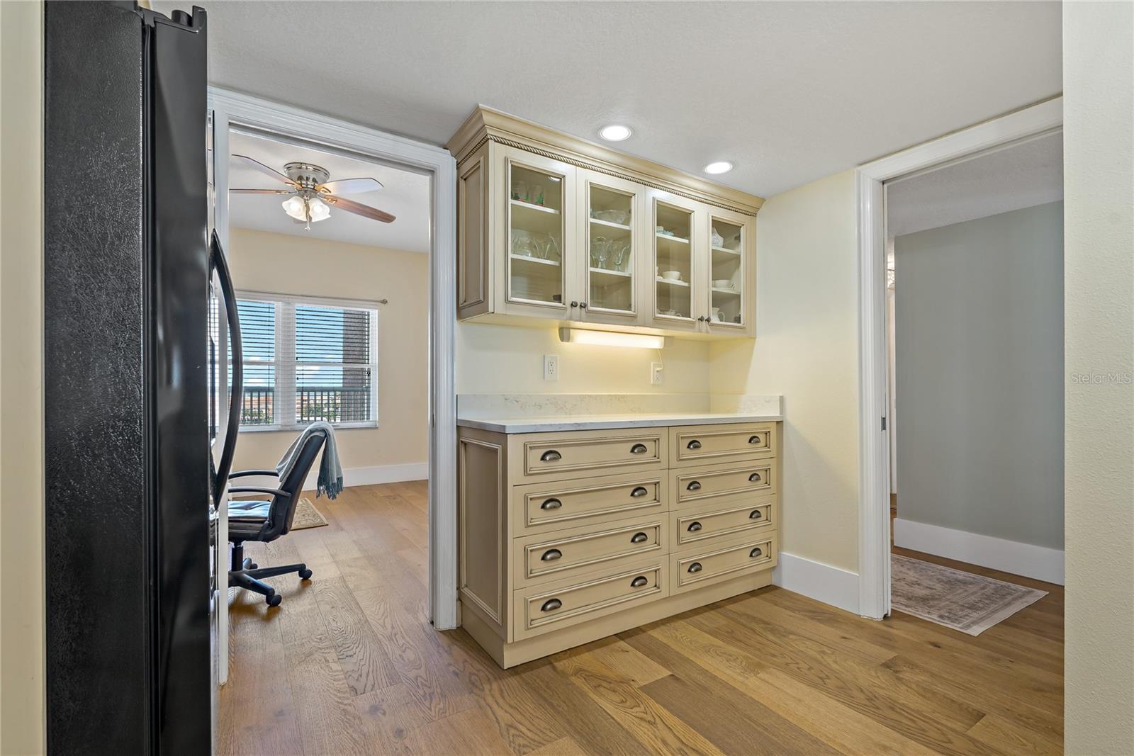 Kitchen with view of office and Hallway