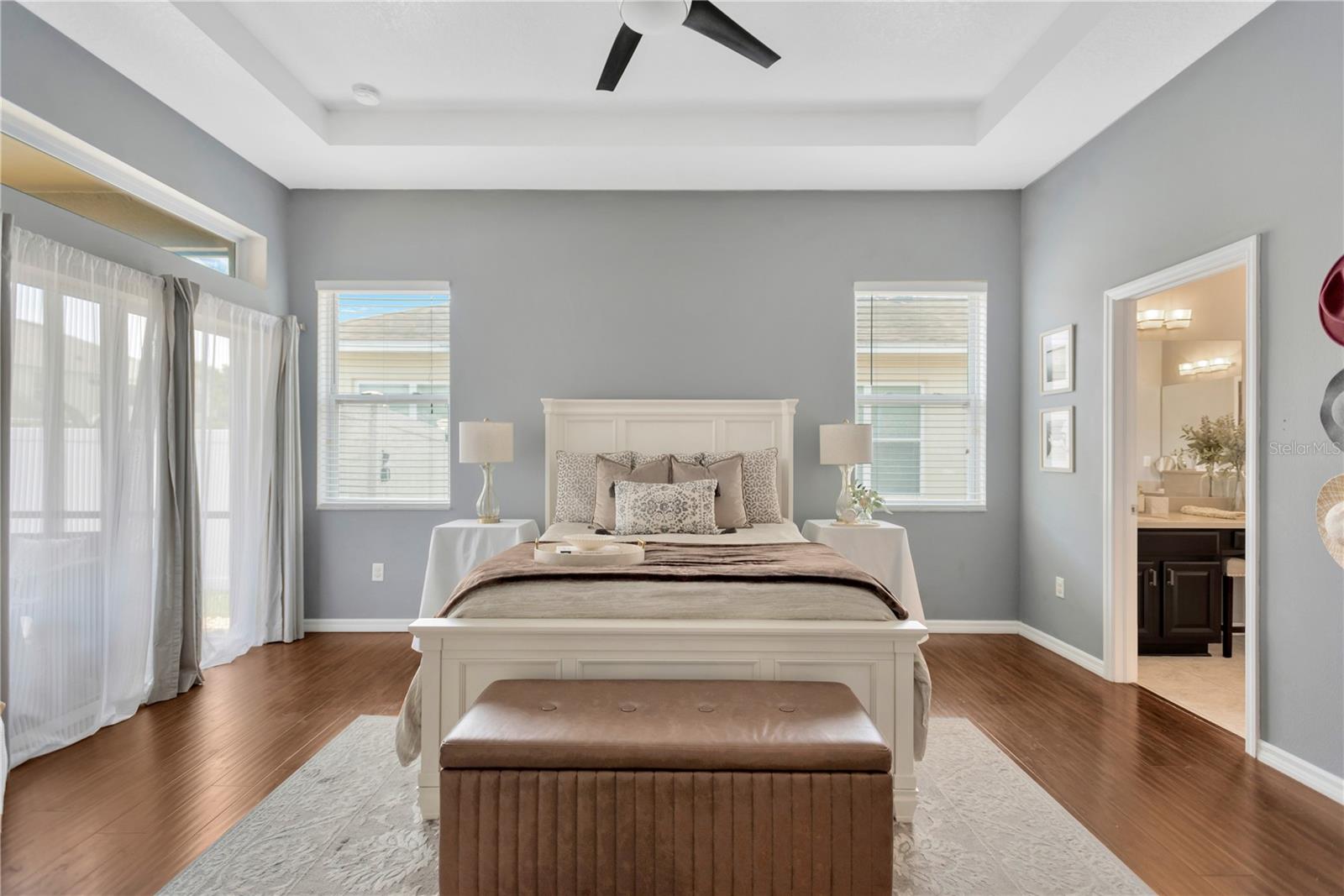 At far end of house you will find expansive Master Bedroom Suite.