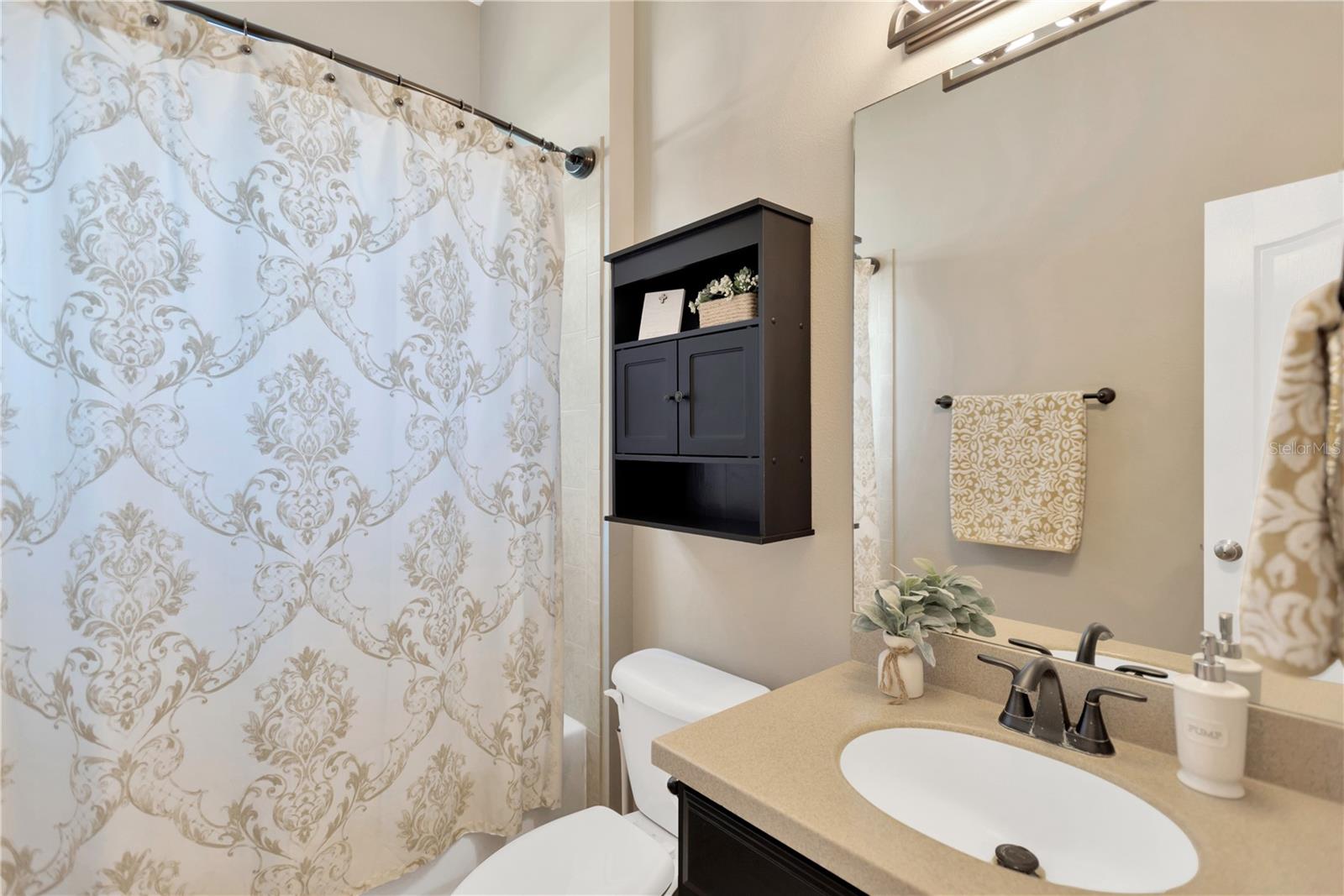 Tastefully appointed Guest Bathroom will delight.