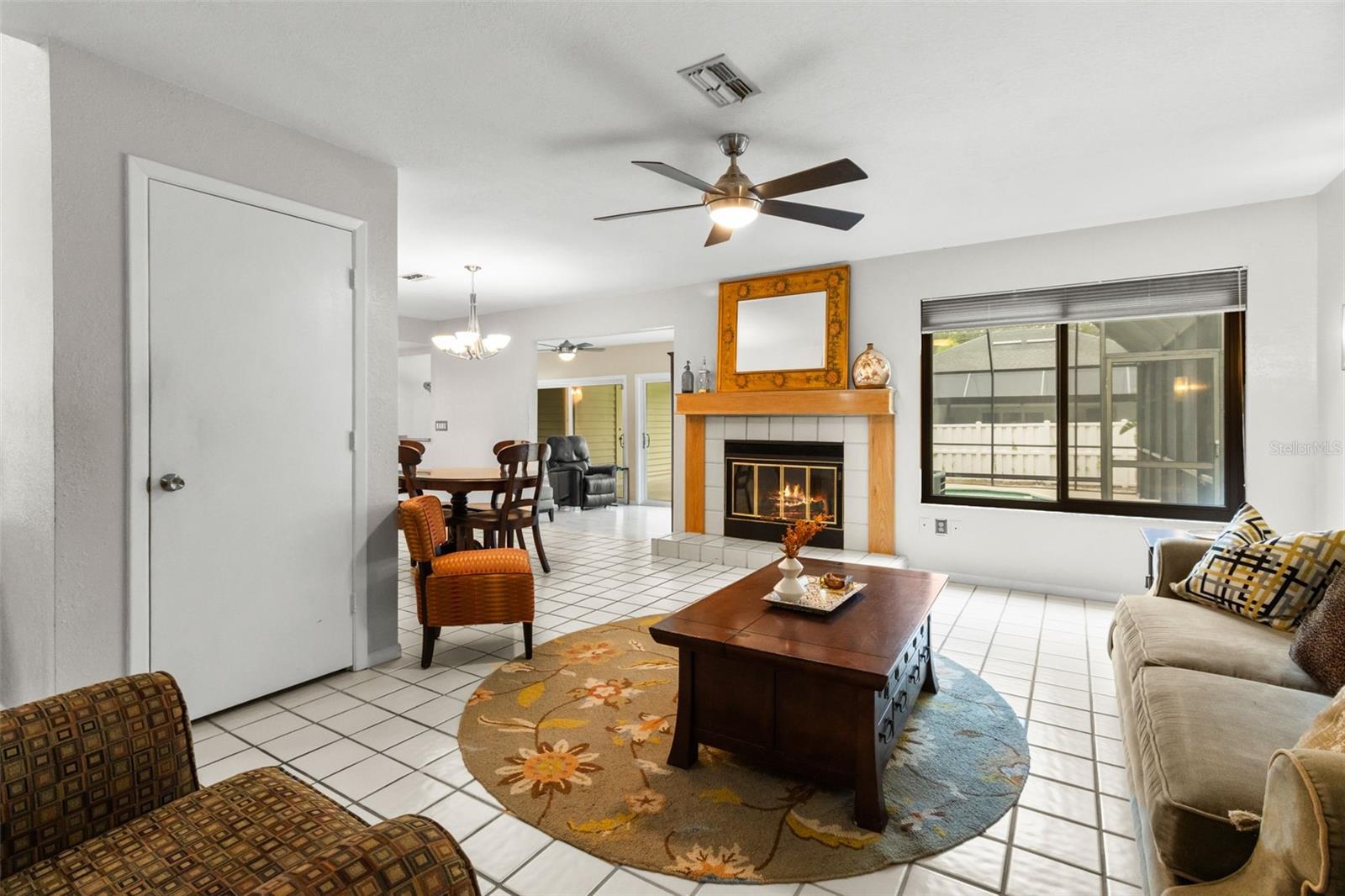 Living Room with Fireplace / Dining Room