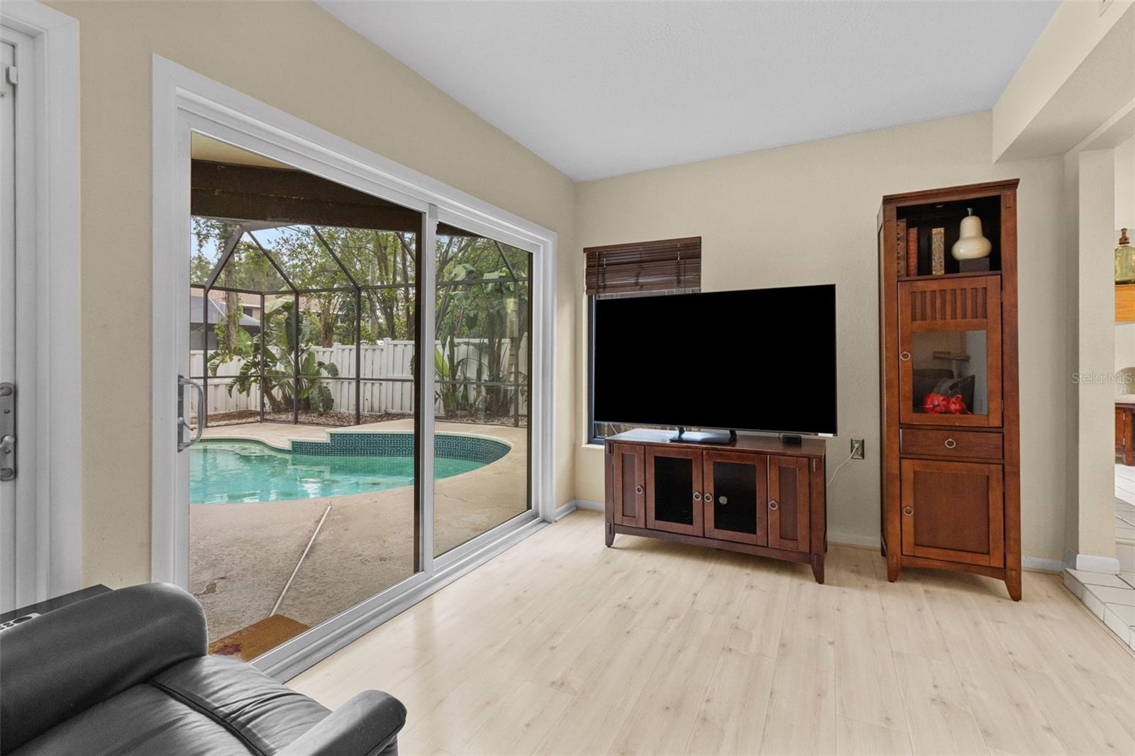 Florida Room with Lanai and Pool View