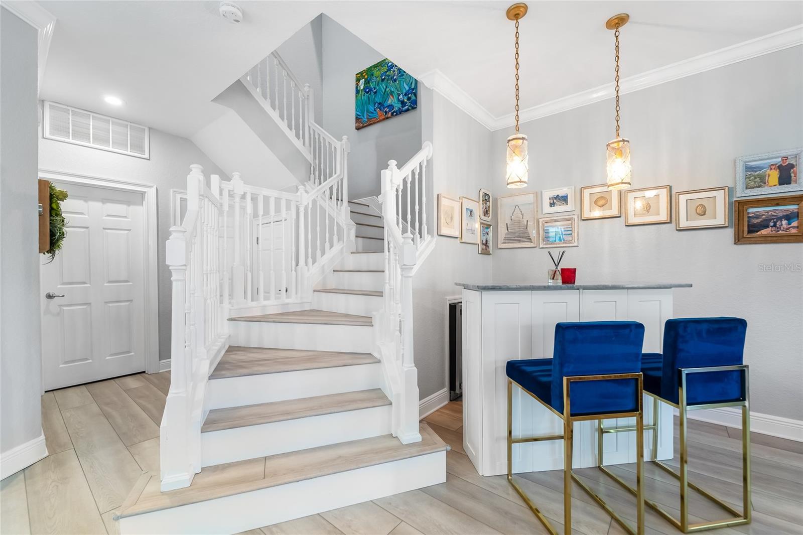 Dramatic staircase to the second floor.