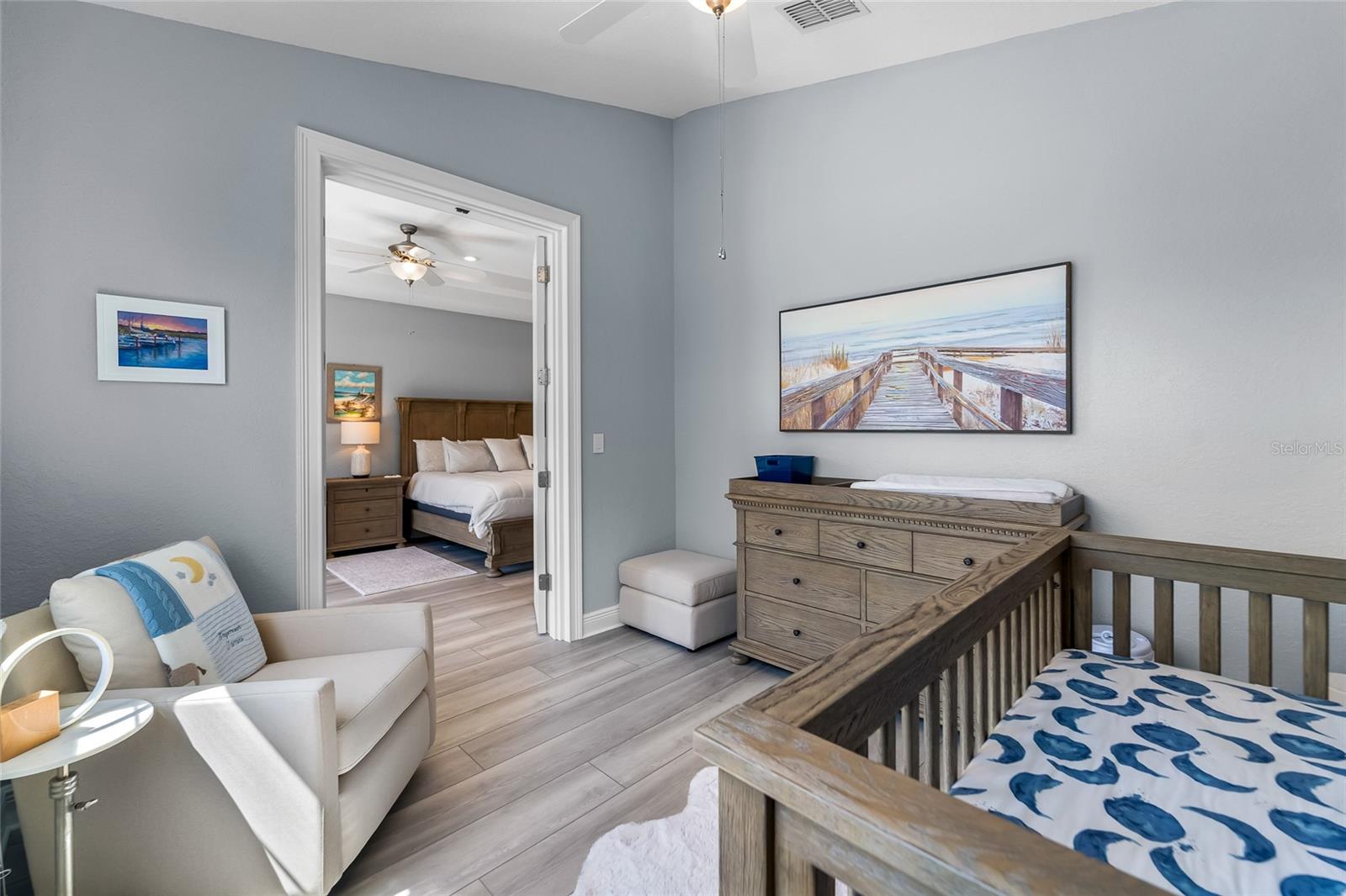 4th bedroom off the primary suite makes for an office, nursery, sitting room, media room, or gym.