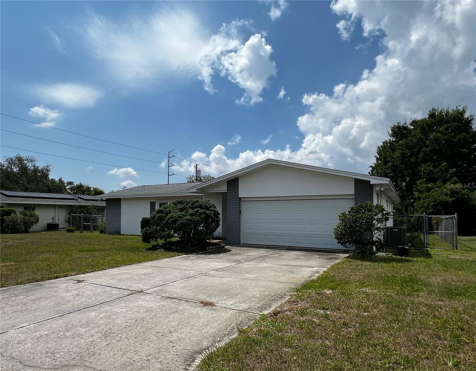 Front of this 4 BR 2 BA 2 car garage Clearwater home.