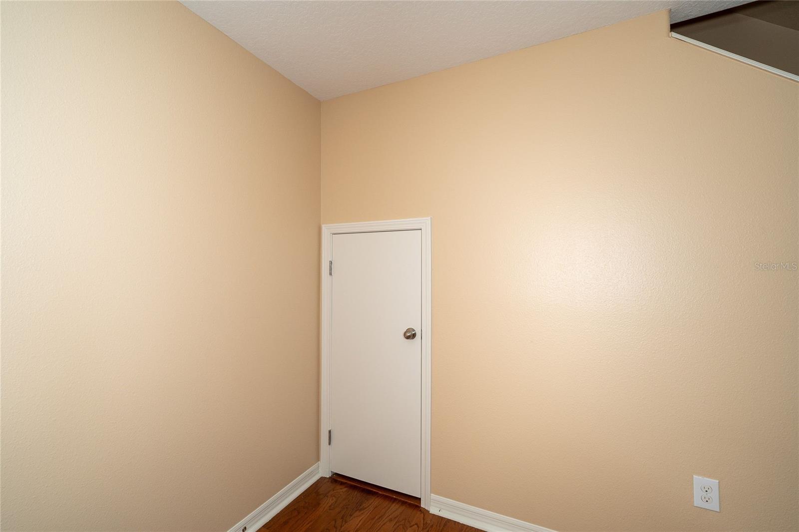 Dining Room with storage under stairs/Water Heater