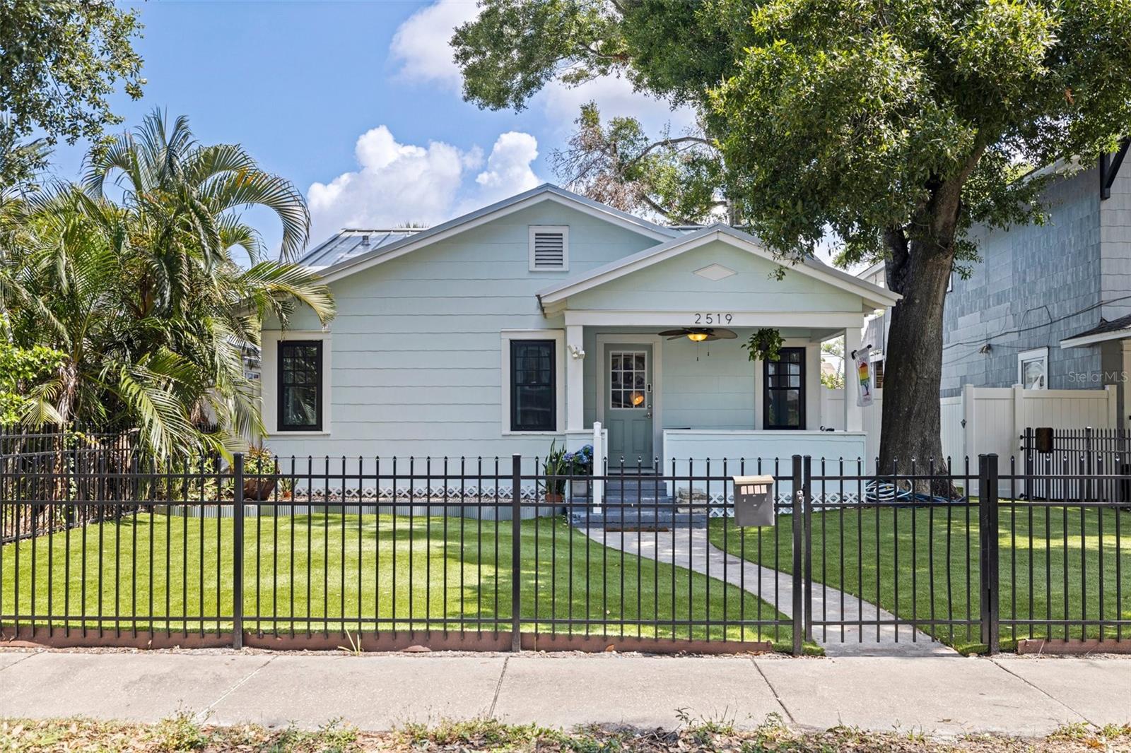 New turf lawn makes this city bungalow standout!