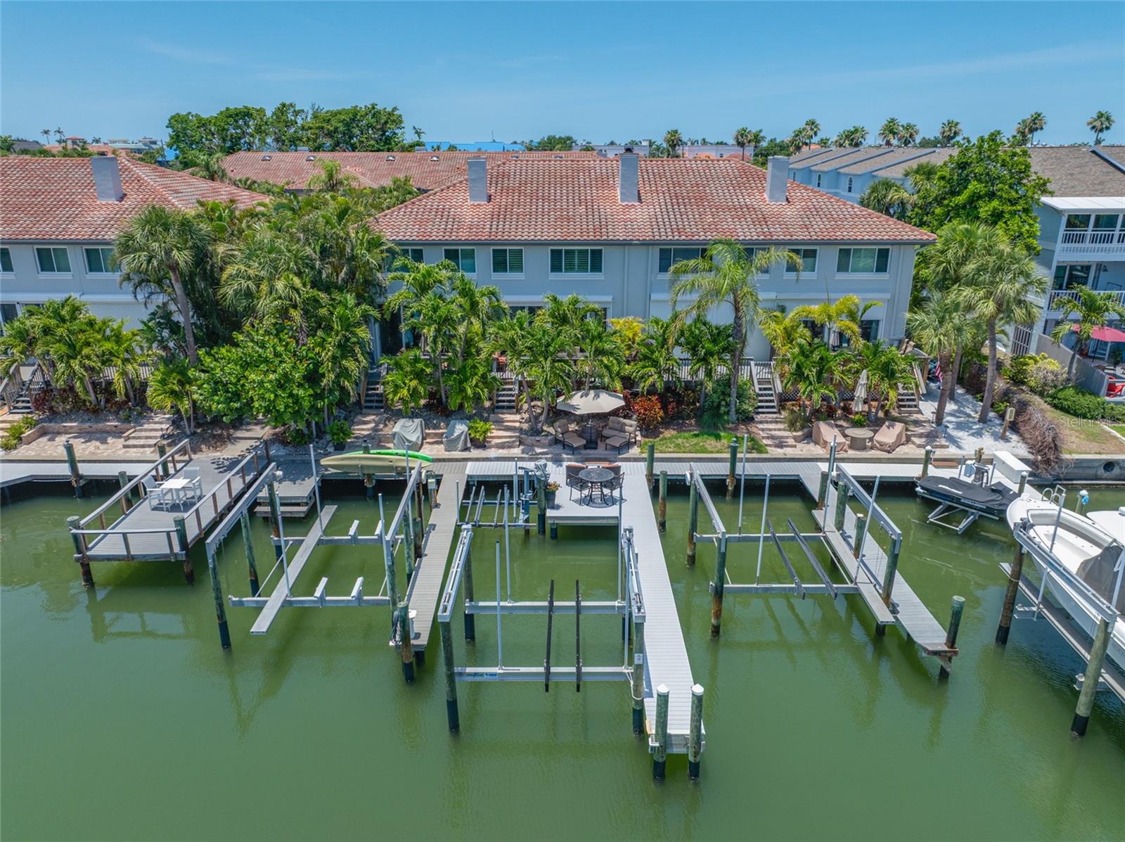 Boat slip is 21ft wide. Dock is 50 ft long plus deck area over the water, 16,000 lb. lift has never been used, double rack jet ski lift.